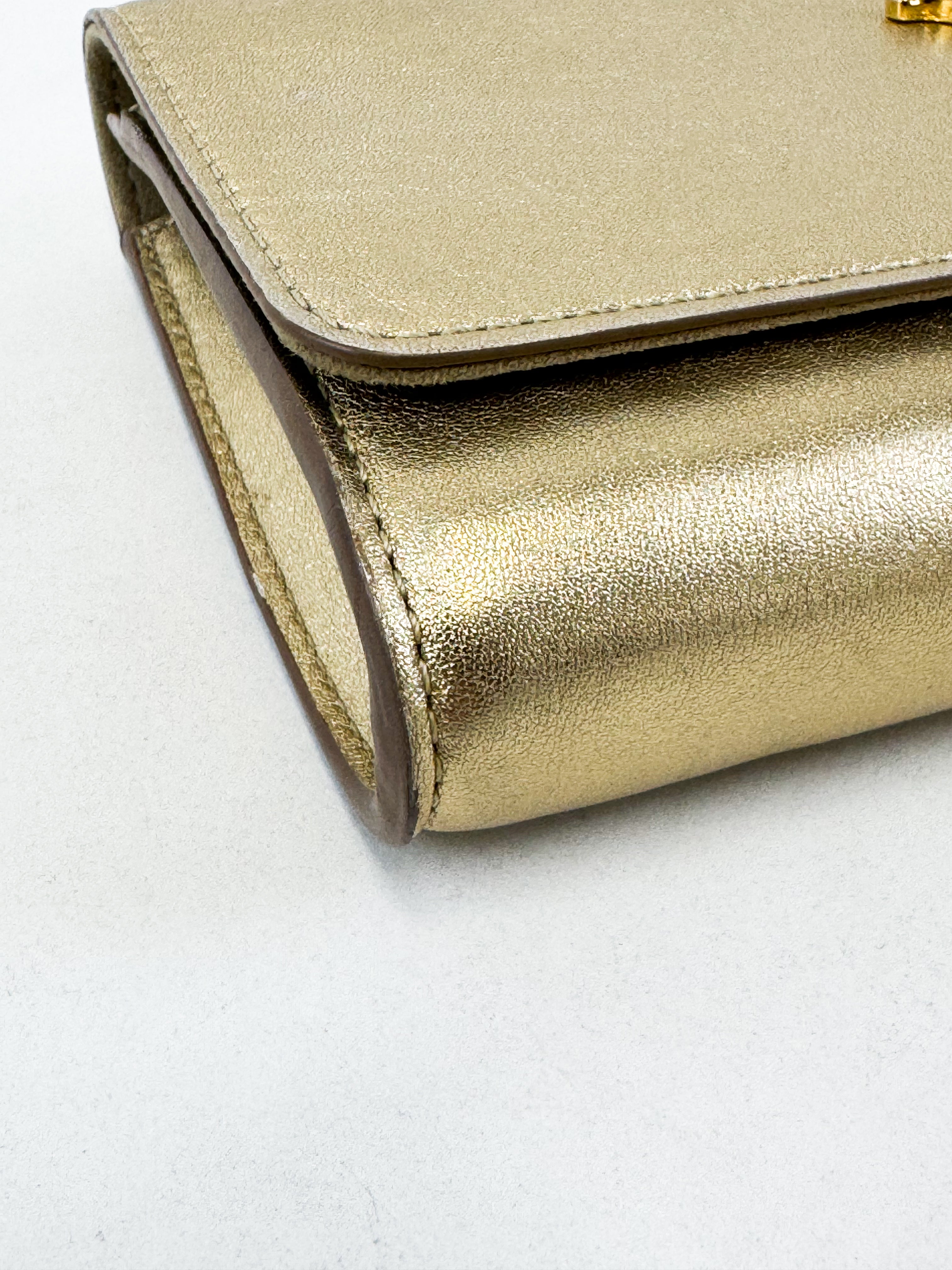 Louis Vuitton Gold St Louise Clutch
