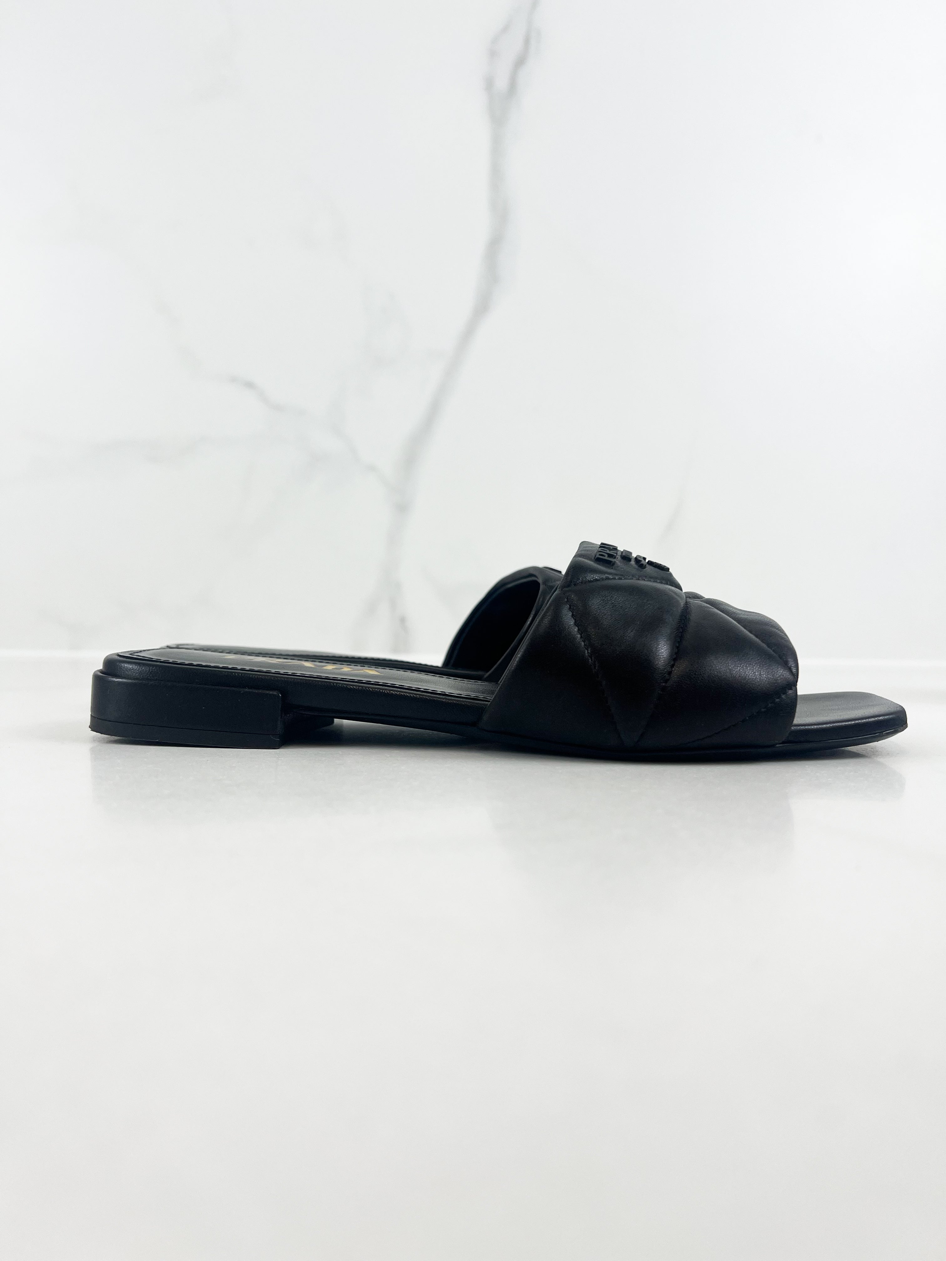 Prada Quilted Nappa Leather Slides in Black Size 38.5