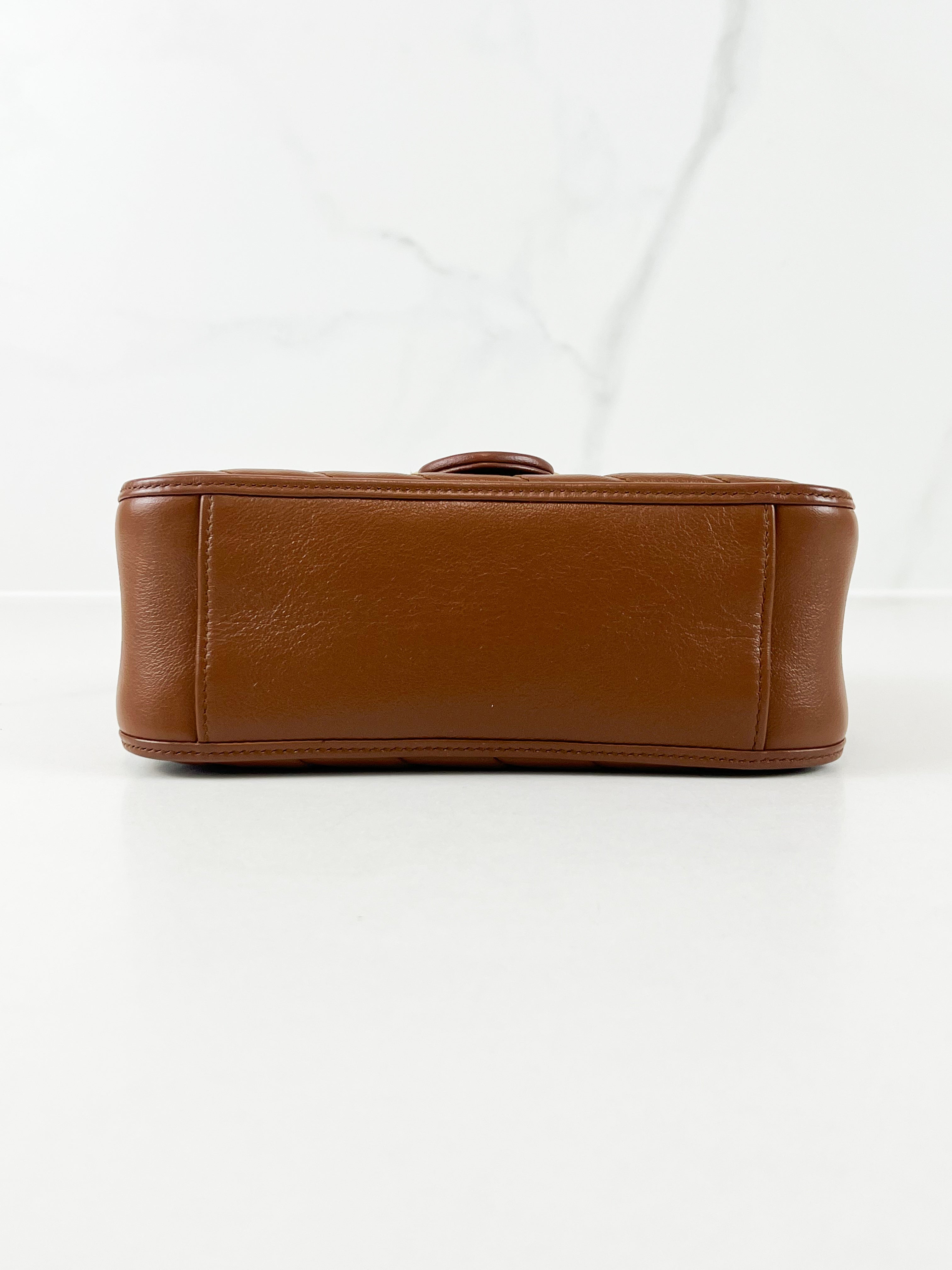 Gucci GG Marmont Matelasse Top Handle Bag in Brown
