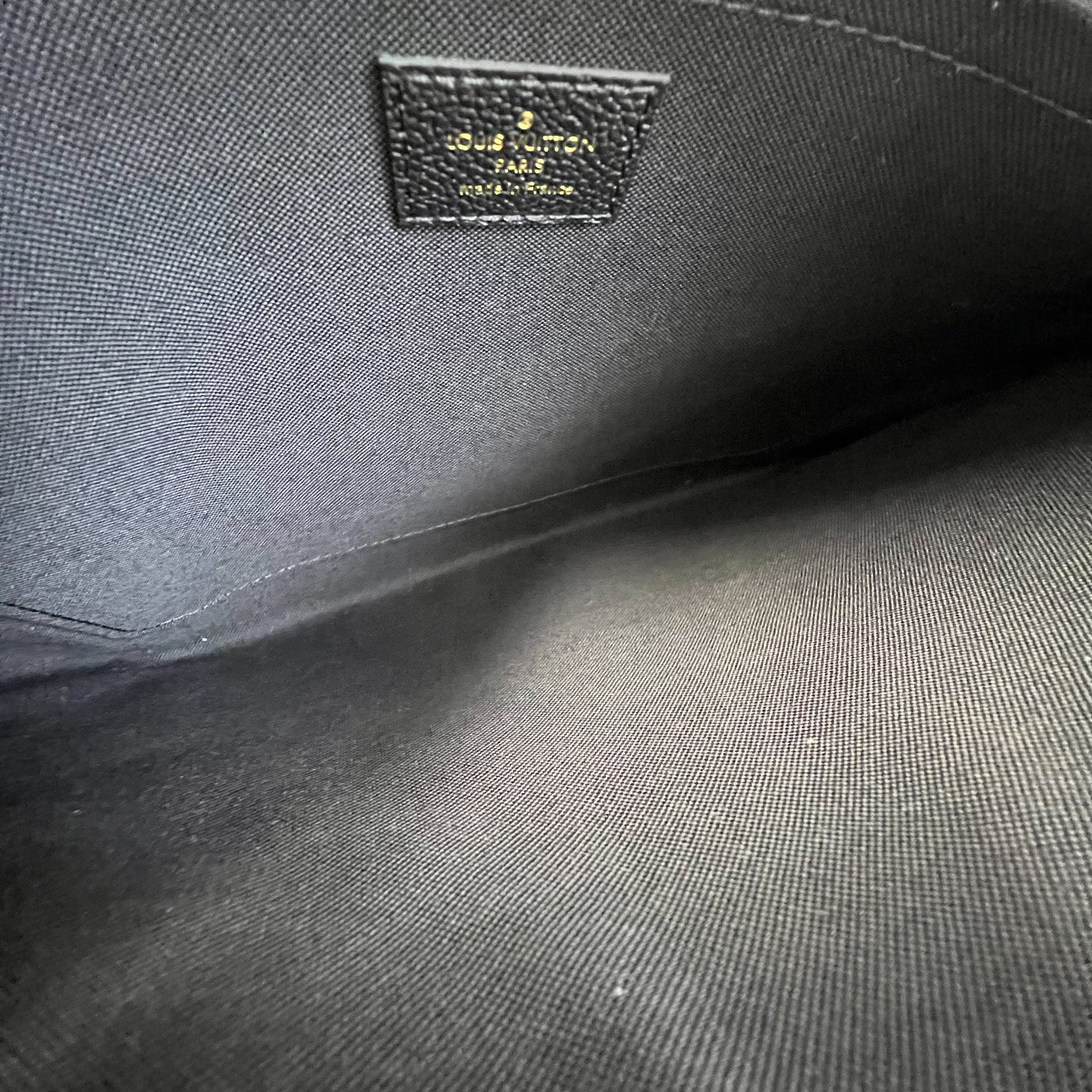 Louis Vuitton Monogram Empreinte Leather Daily Pouch
