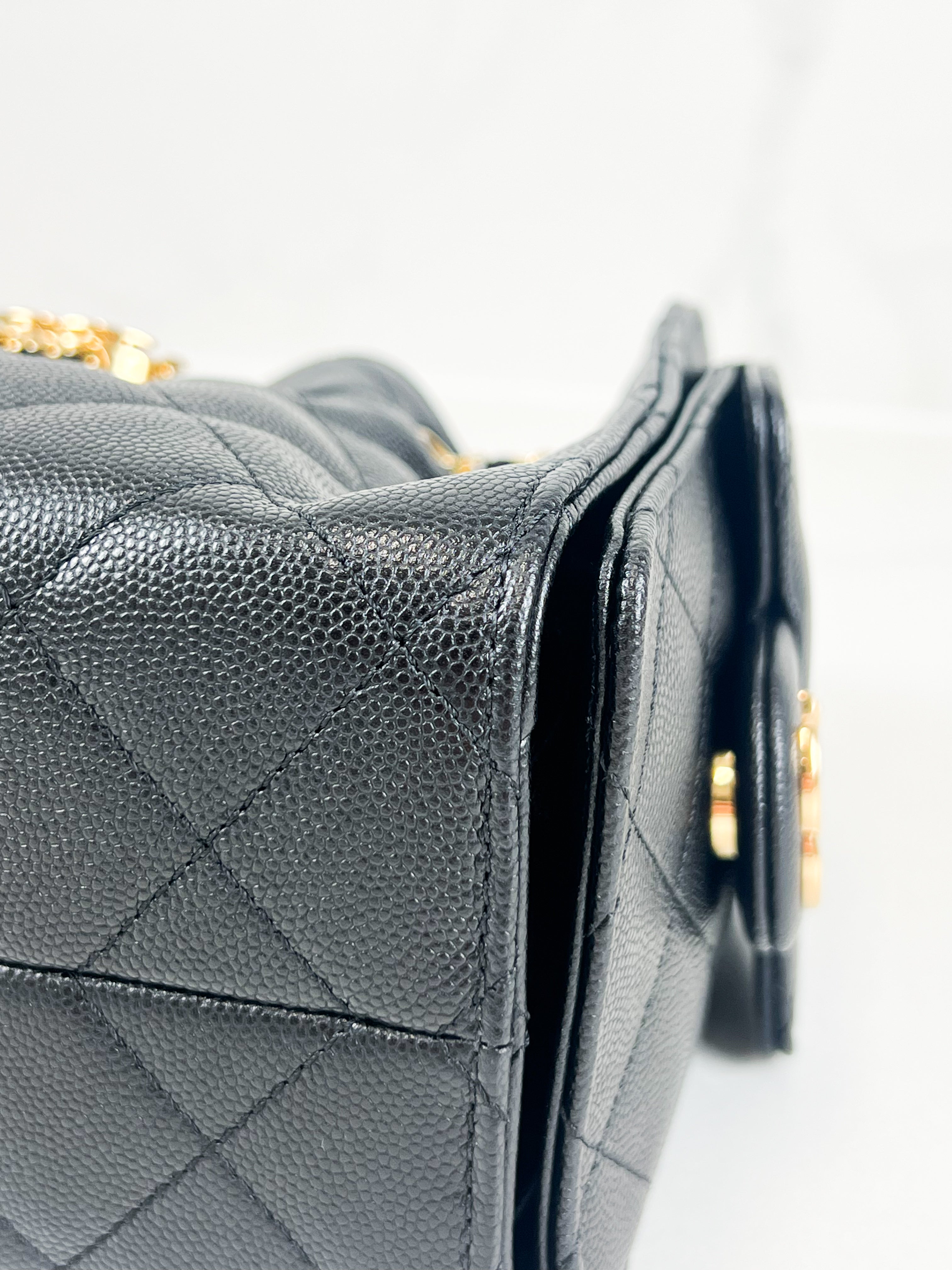 Chanel 25 Mini Handbag in Black Grained Calfskin & Gold-Tone Metal