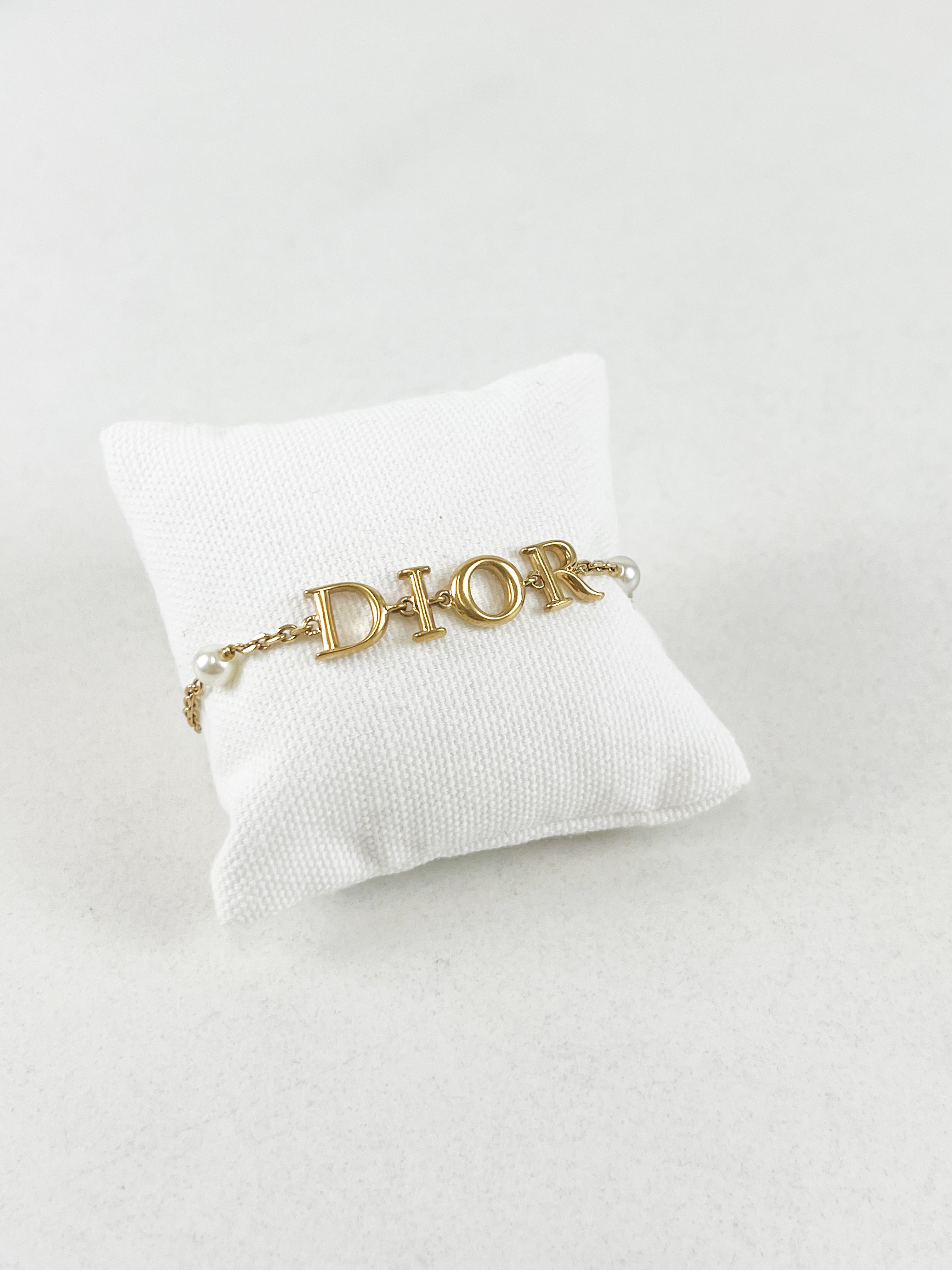 Christian Dior Revolution Bracelet in Gold with White Resin Pearls