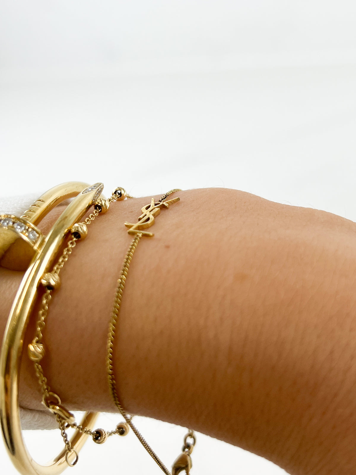 Saint Laurent Cassandre Gold Bracelet