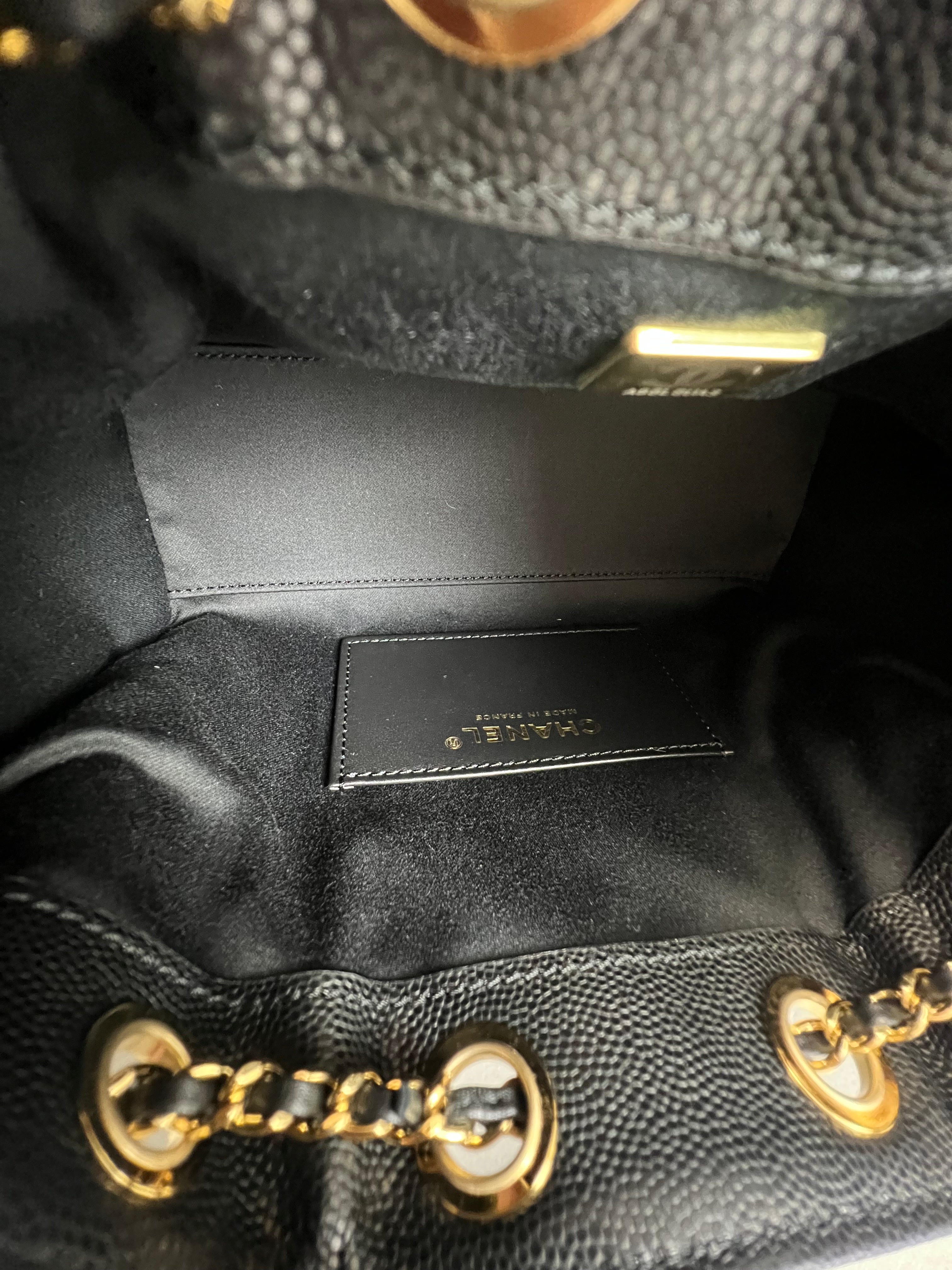 Chanel 25 Mini Handbag in Black Grained Calfskin & Gold-Tone Metal