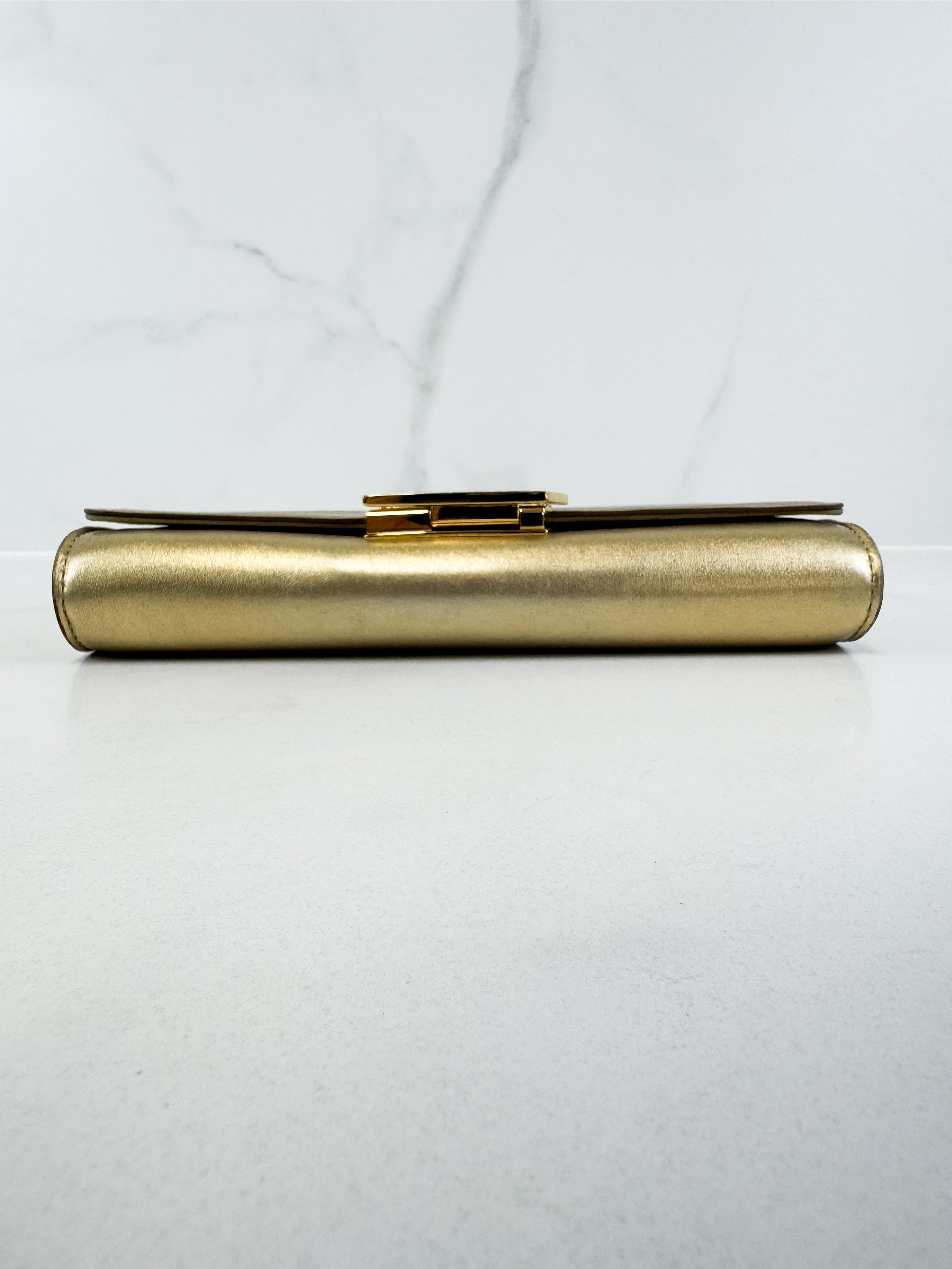 Louis Vuitton Gold St Louise Clutch