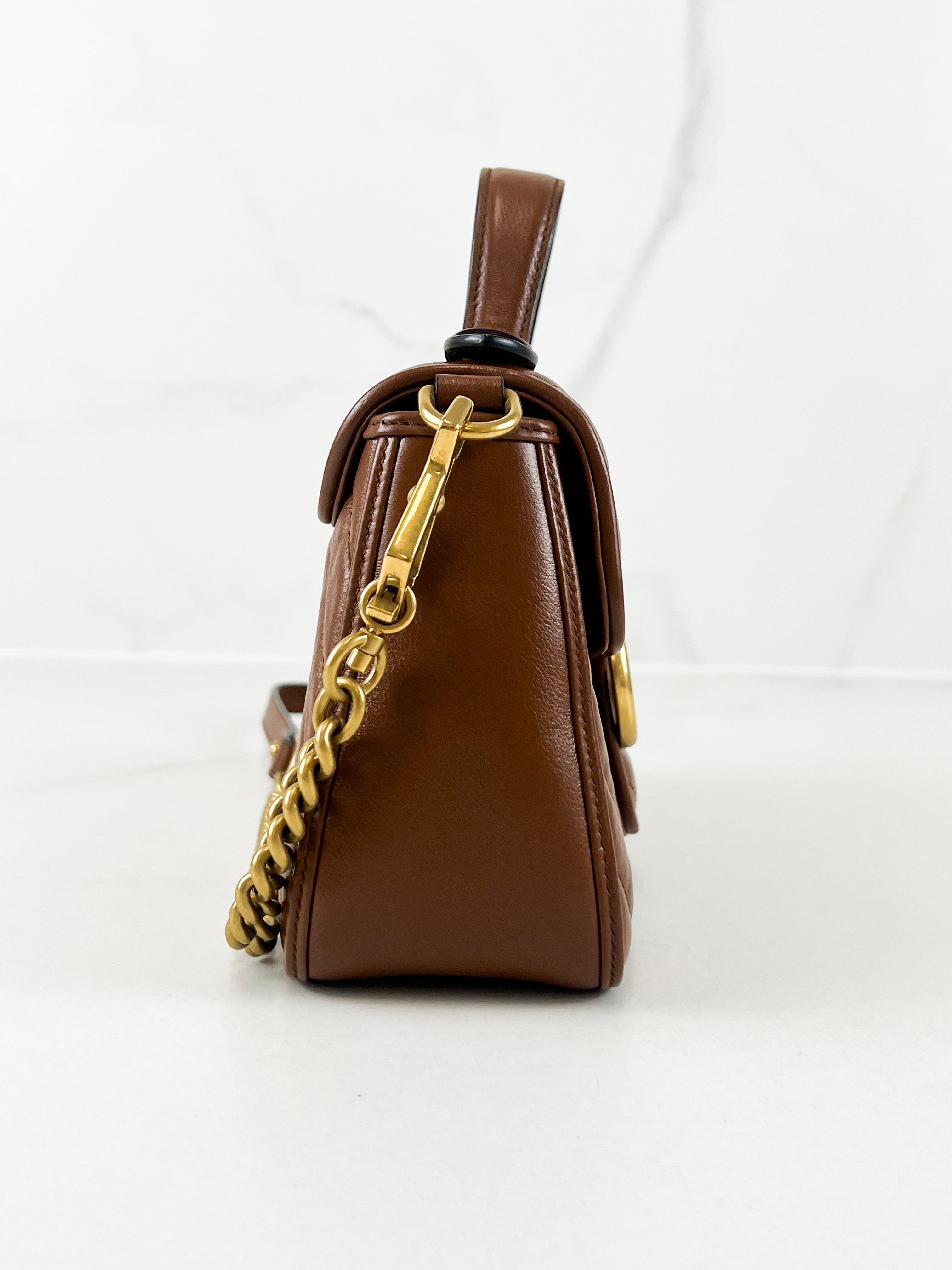 Gucci GG Marmont Matelasse Top Handle Bag in Brown