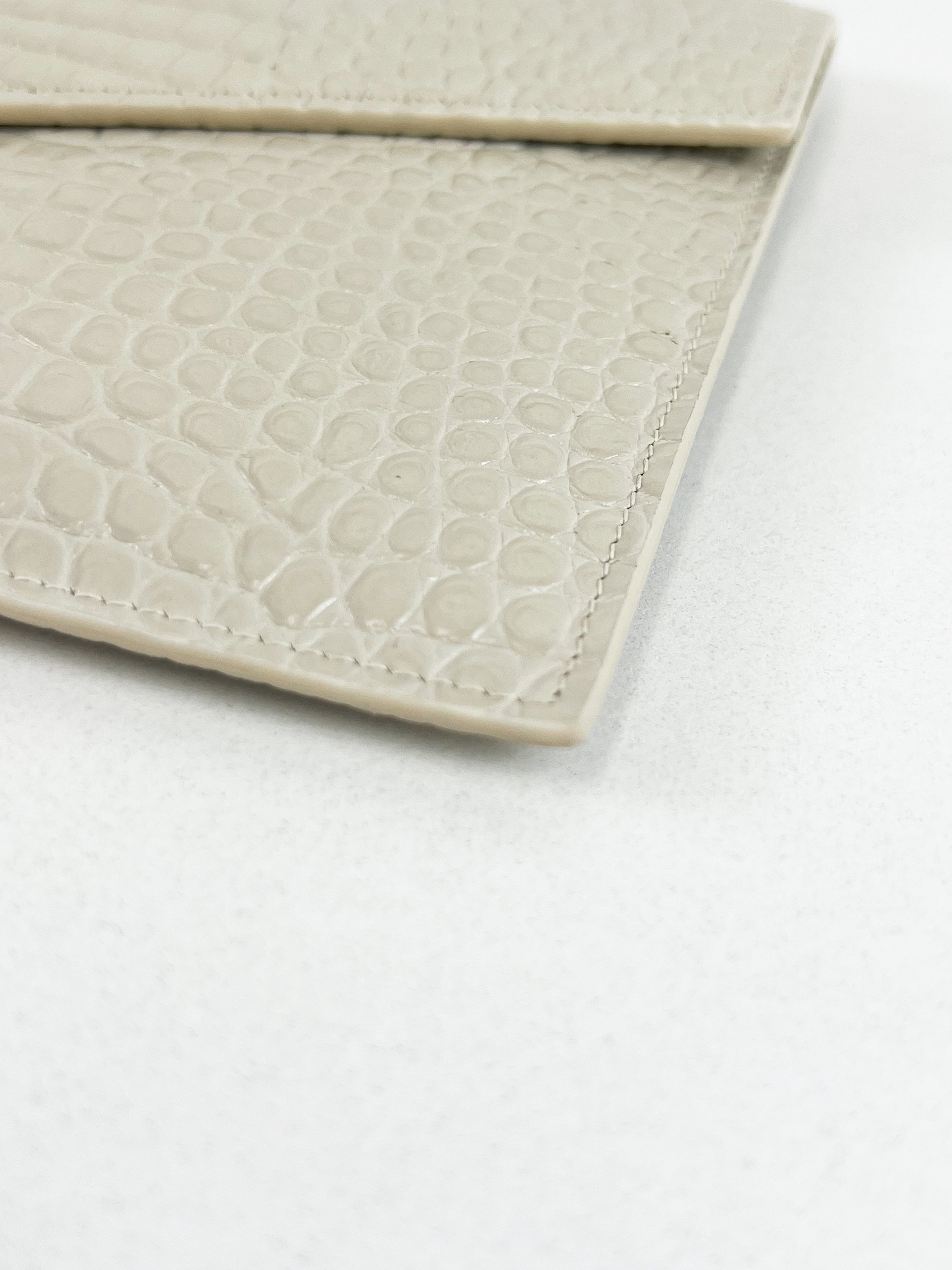 Saint Laurent Beige Uptown Pouch in Crema Soft Croc-Effect Leather