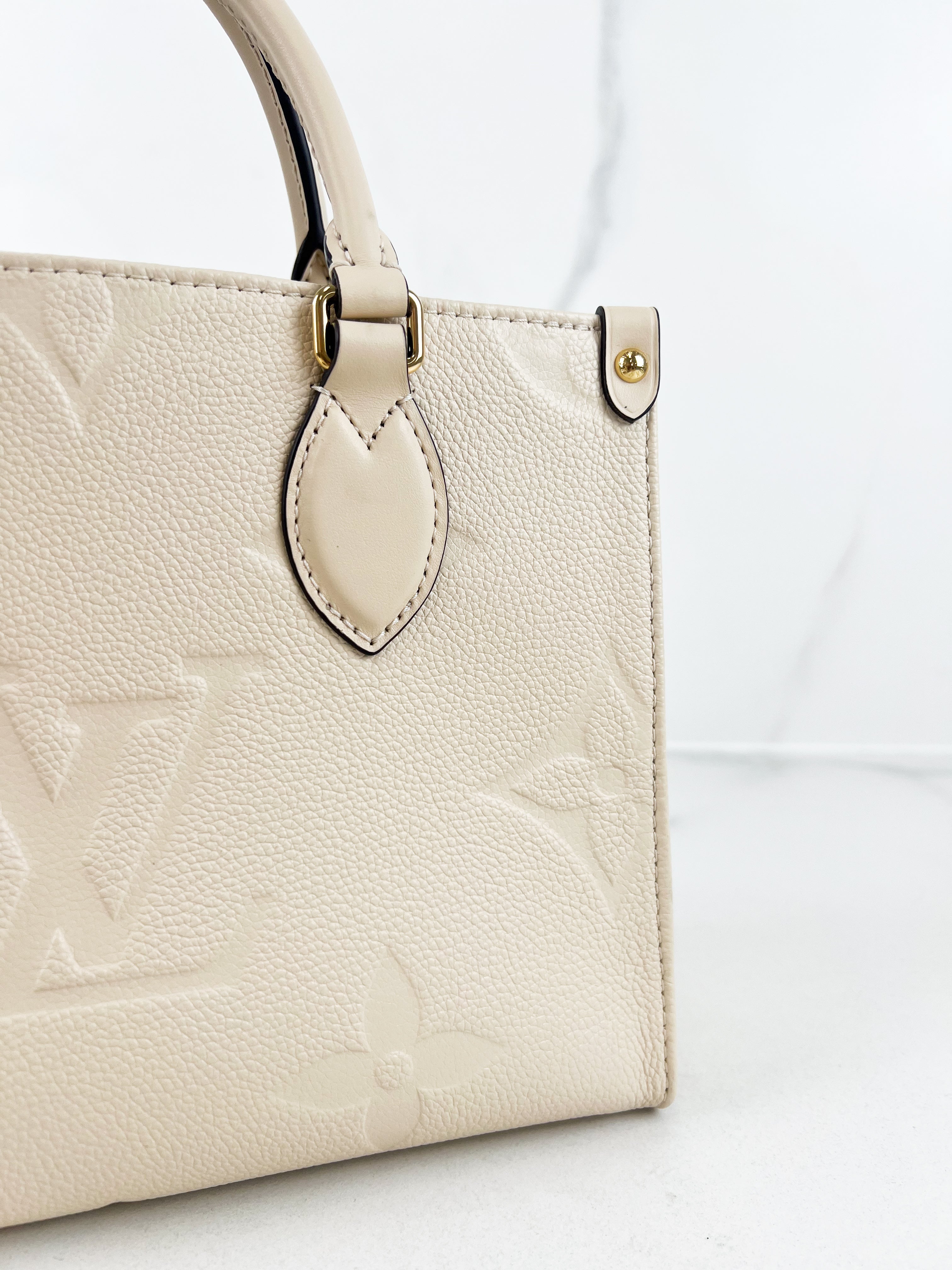Louis Vuitton Onthego PM Cream