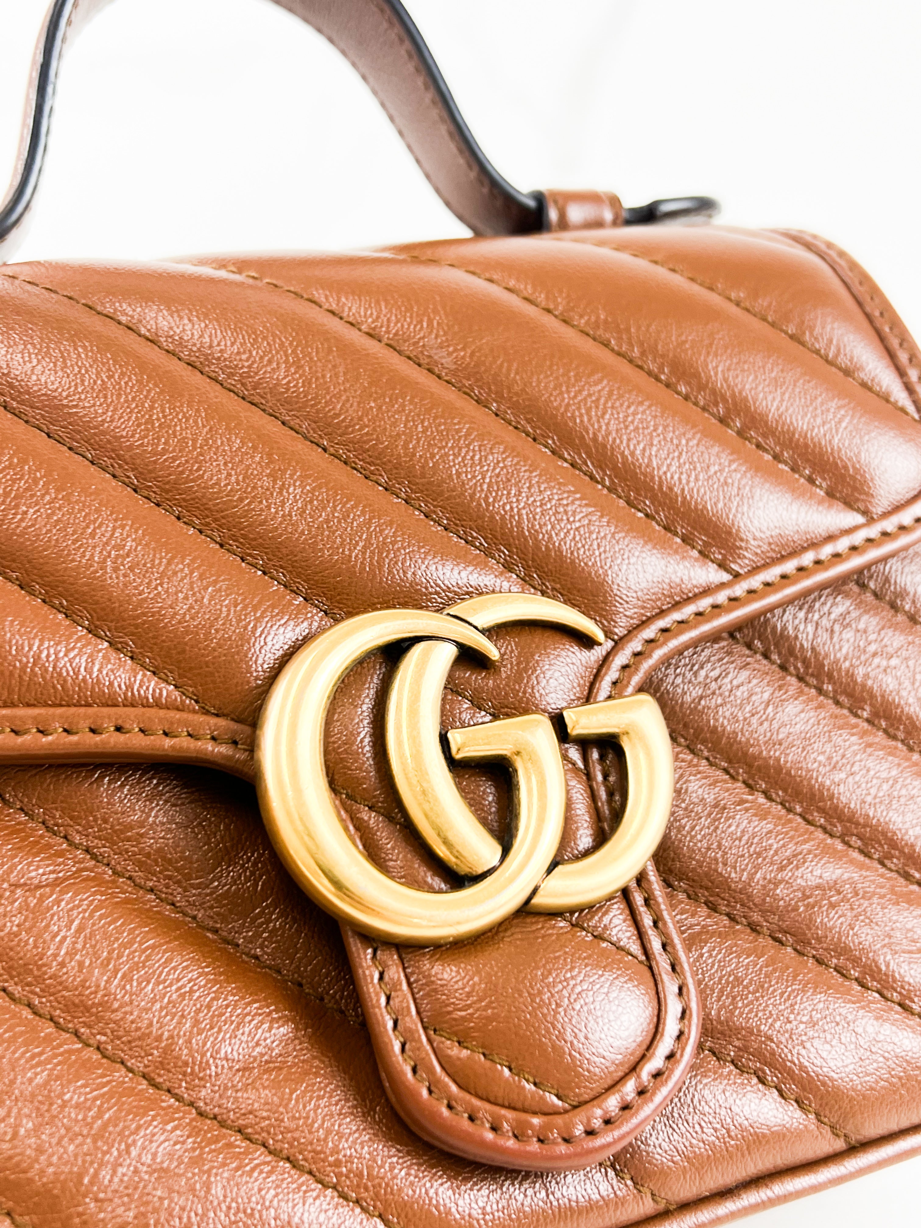 Gucci GG Marmont Matelasse Top Handle Bag in Brown