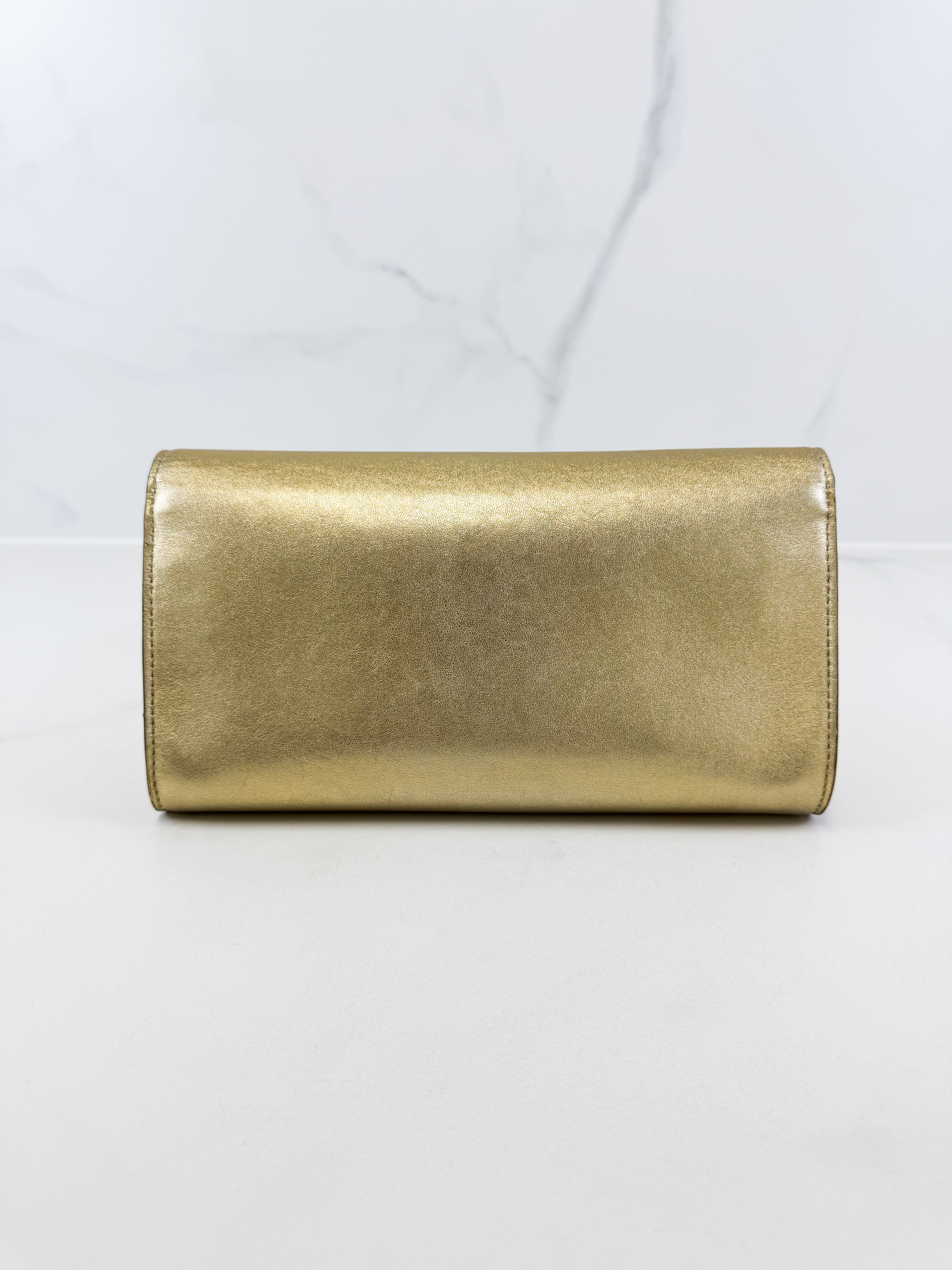 Louis Vuitton Gold St Louise Clutch