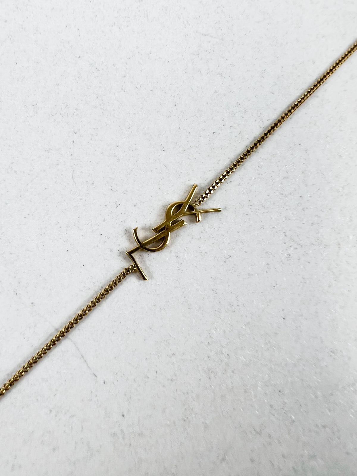 Saint Laurent Cassandre Gold Bracelet