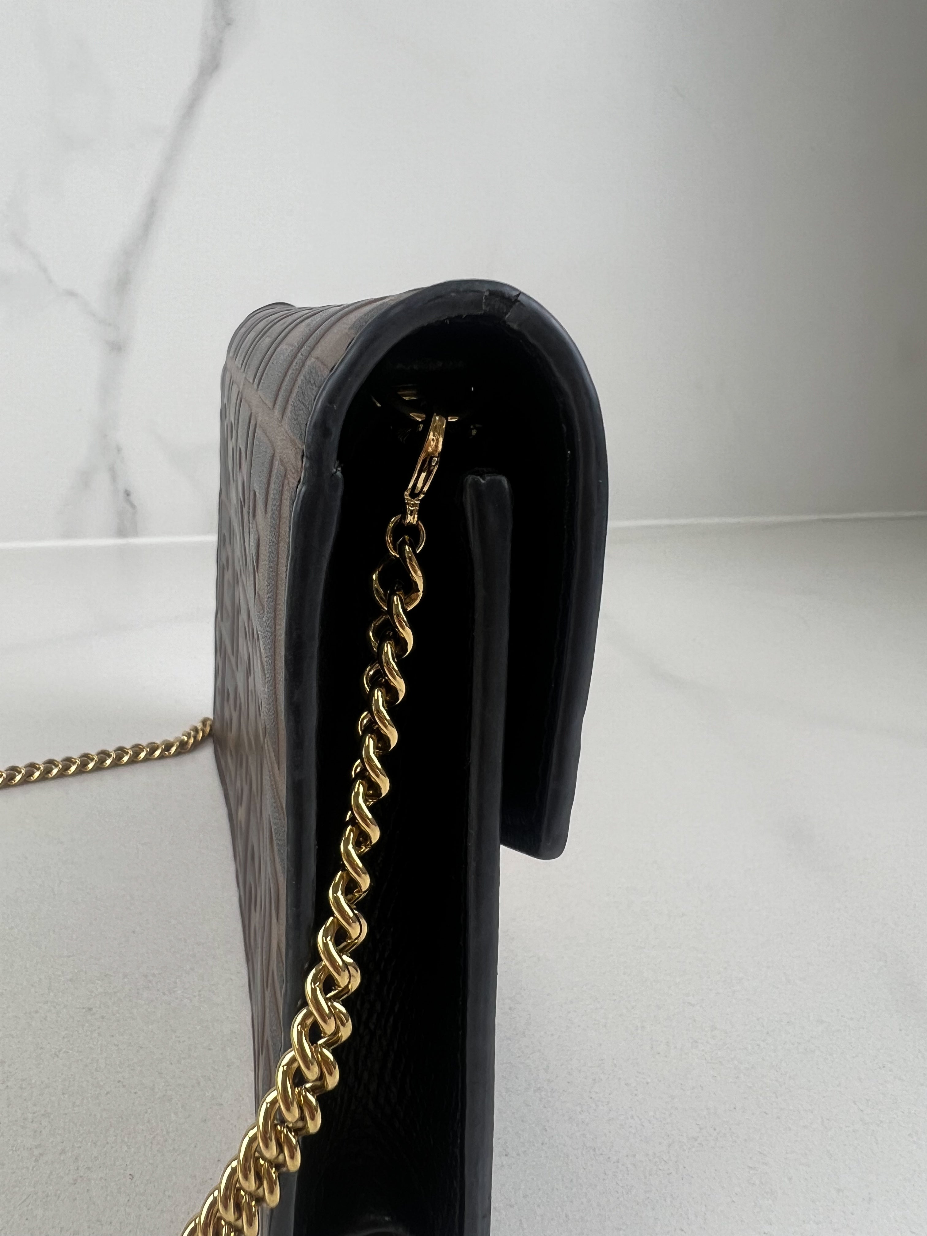 Fendi F is Fendi Envelope Wallet on Chain