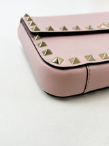 Valentino Garavani Blush Pink Rockstud Leather Clutch