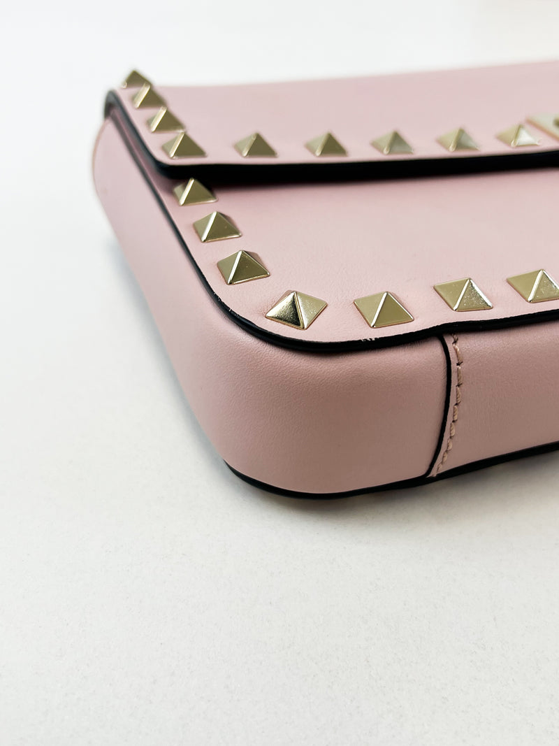 Valentino Garavani Blush Pink Rockstud Leather Clutch