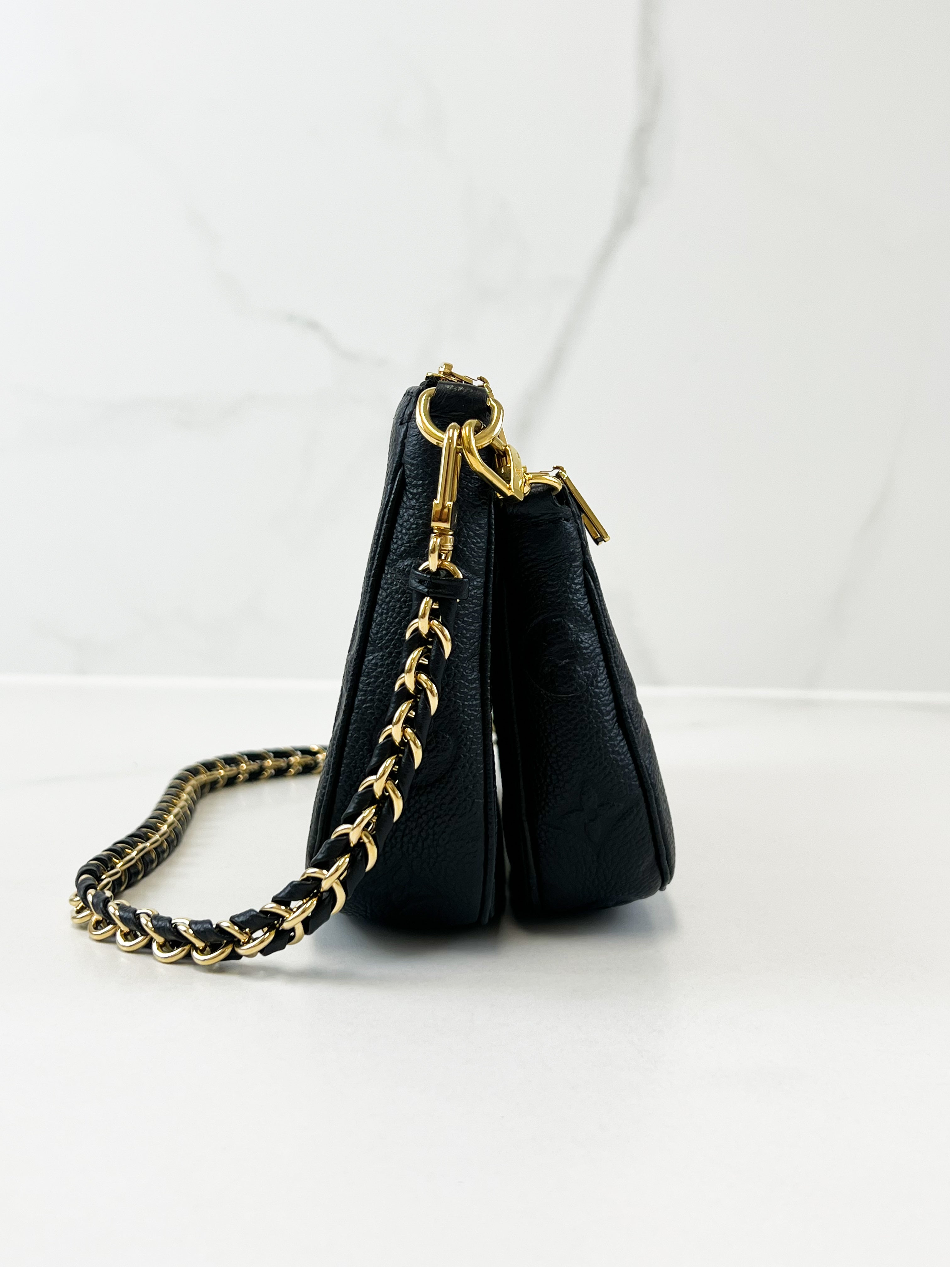 Louis Vuitton Multi Pochette Accessories in Monogram Empreinte Leather