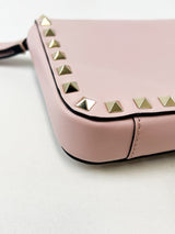 Valentino Garavani Blush Pink Rockstud Leather Clutch