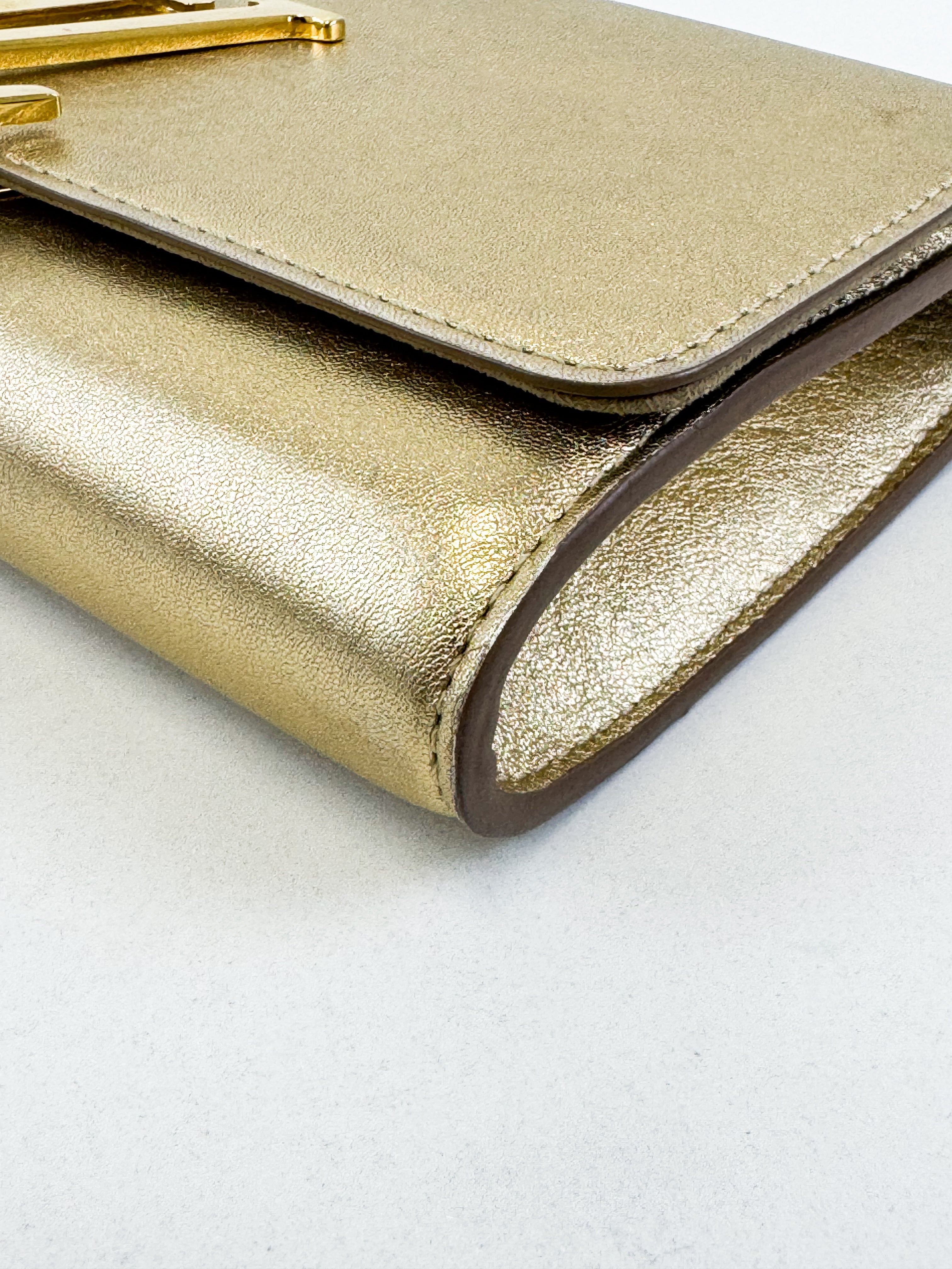 Louis Vuitton Gold St Louise Clutch
