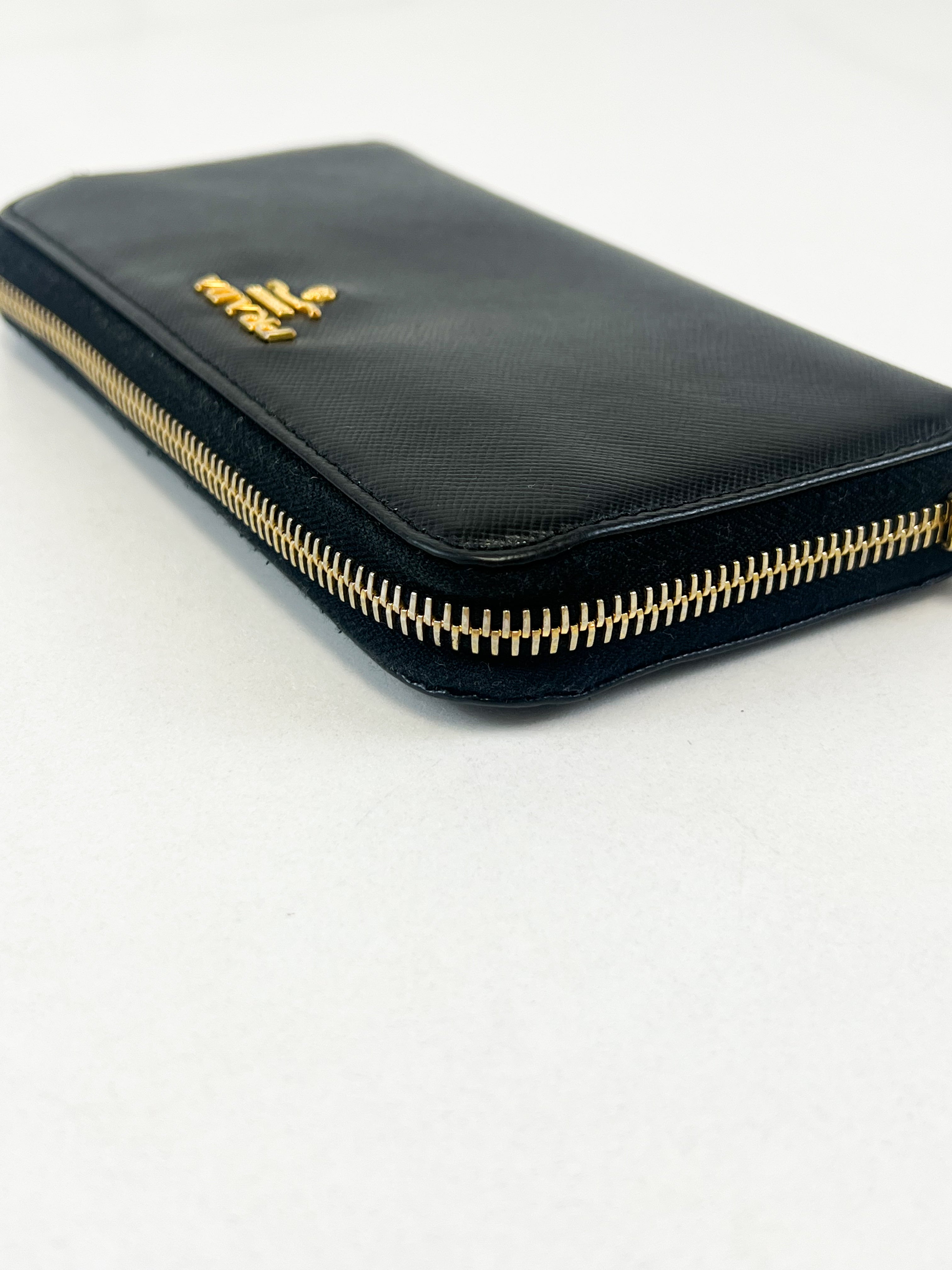 Prada Large Grained Leather Zip Around Wallet