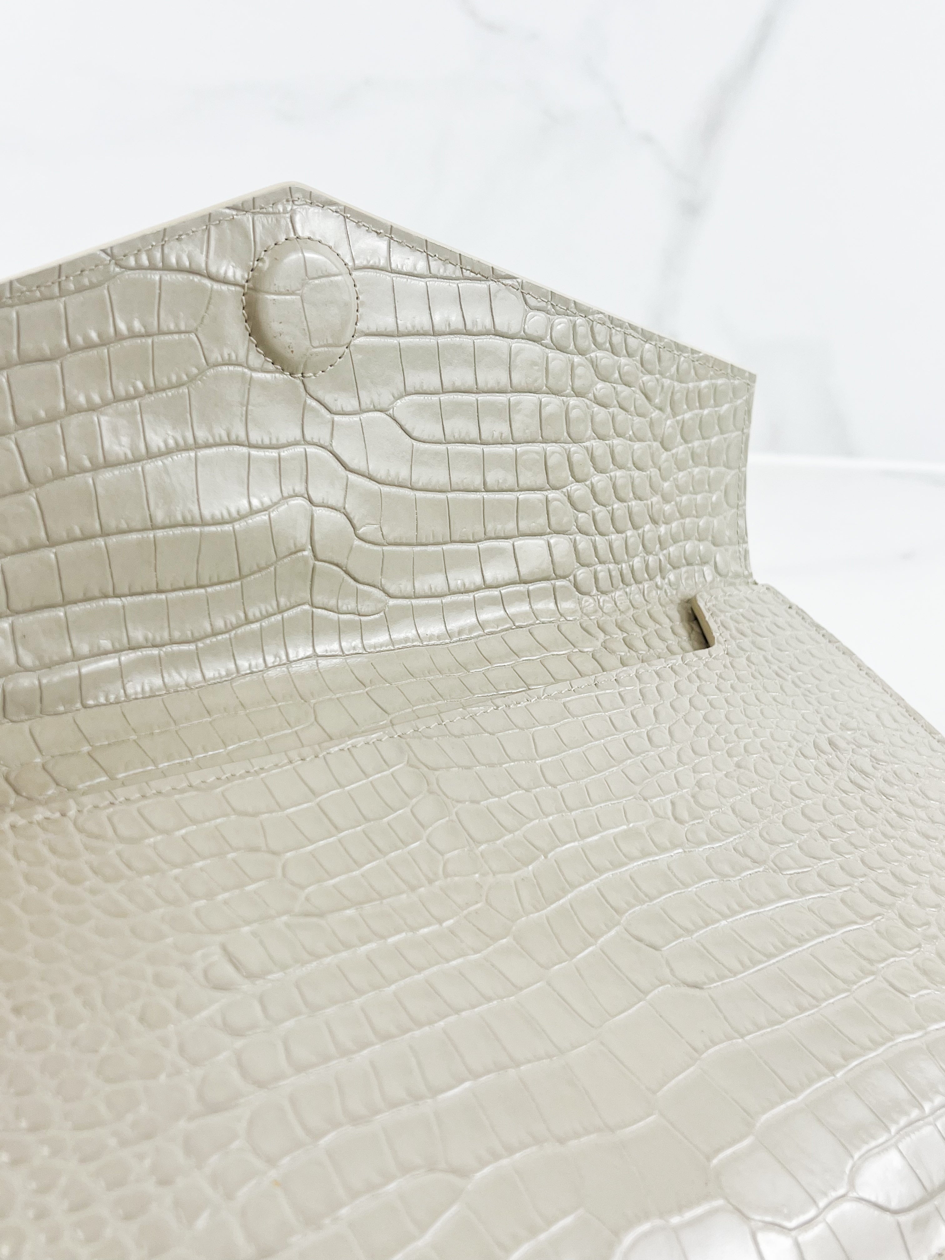 Saint Laurent Beige Uptown Pouch in Crema Soft Croc-Effect Leather