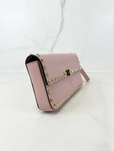 Valentino Garavani Blush Pink Rockstud Leather Clutch