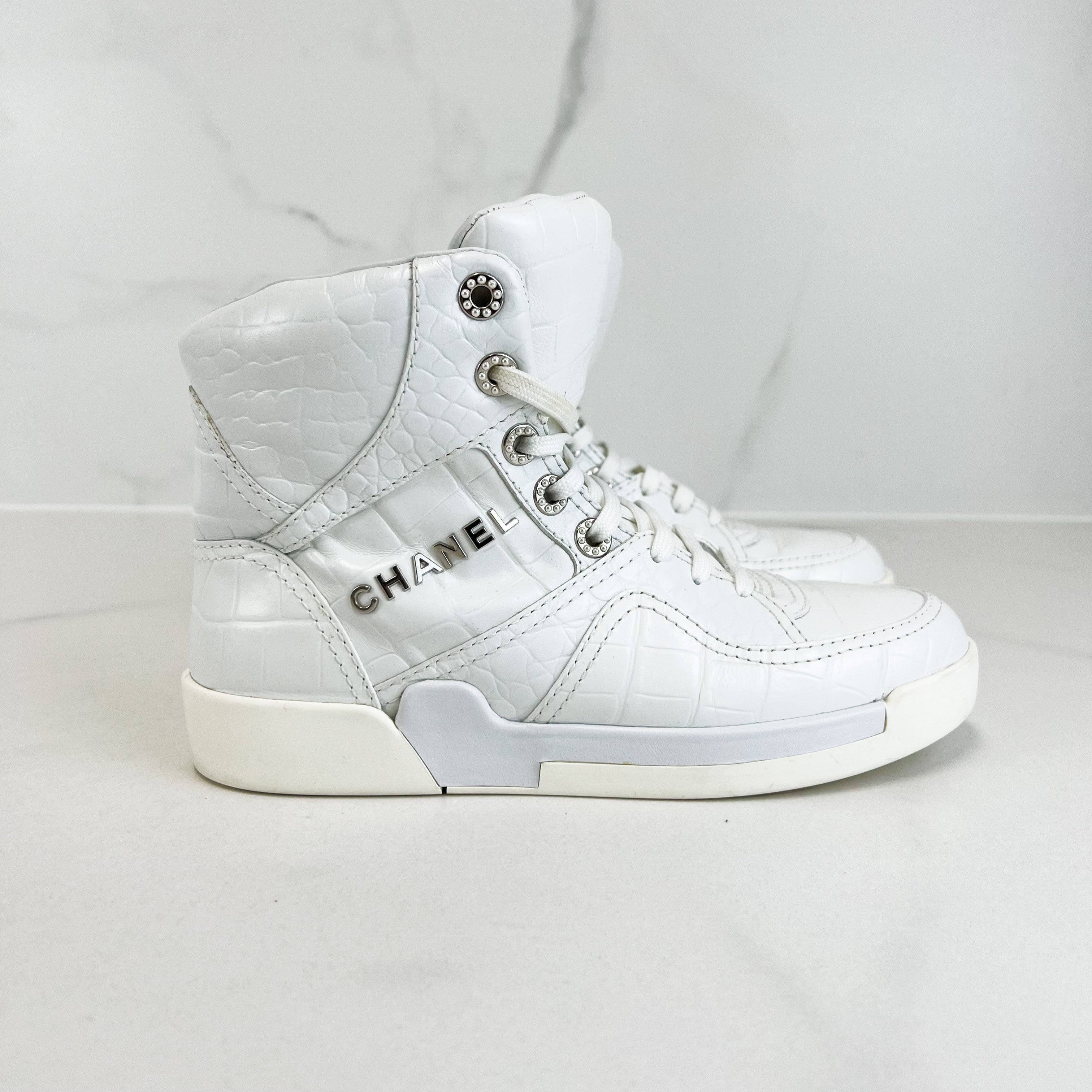 Chanel Croc-Embossed White CC High-Top Sneaker Size 37.5 – Shopluxe  Consignment