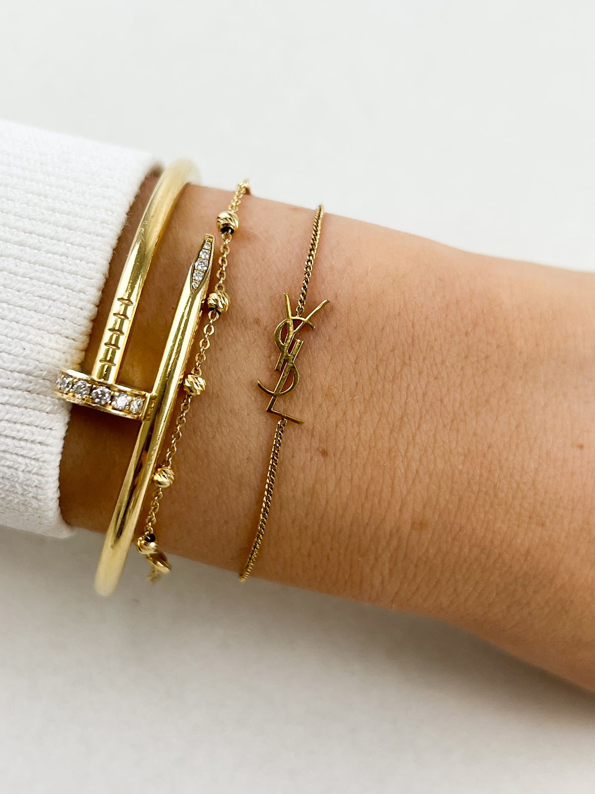 Saint Laurent Cassandre Gold Bracelet
