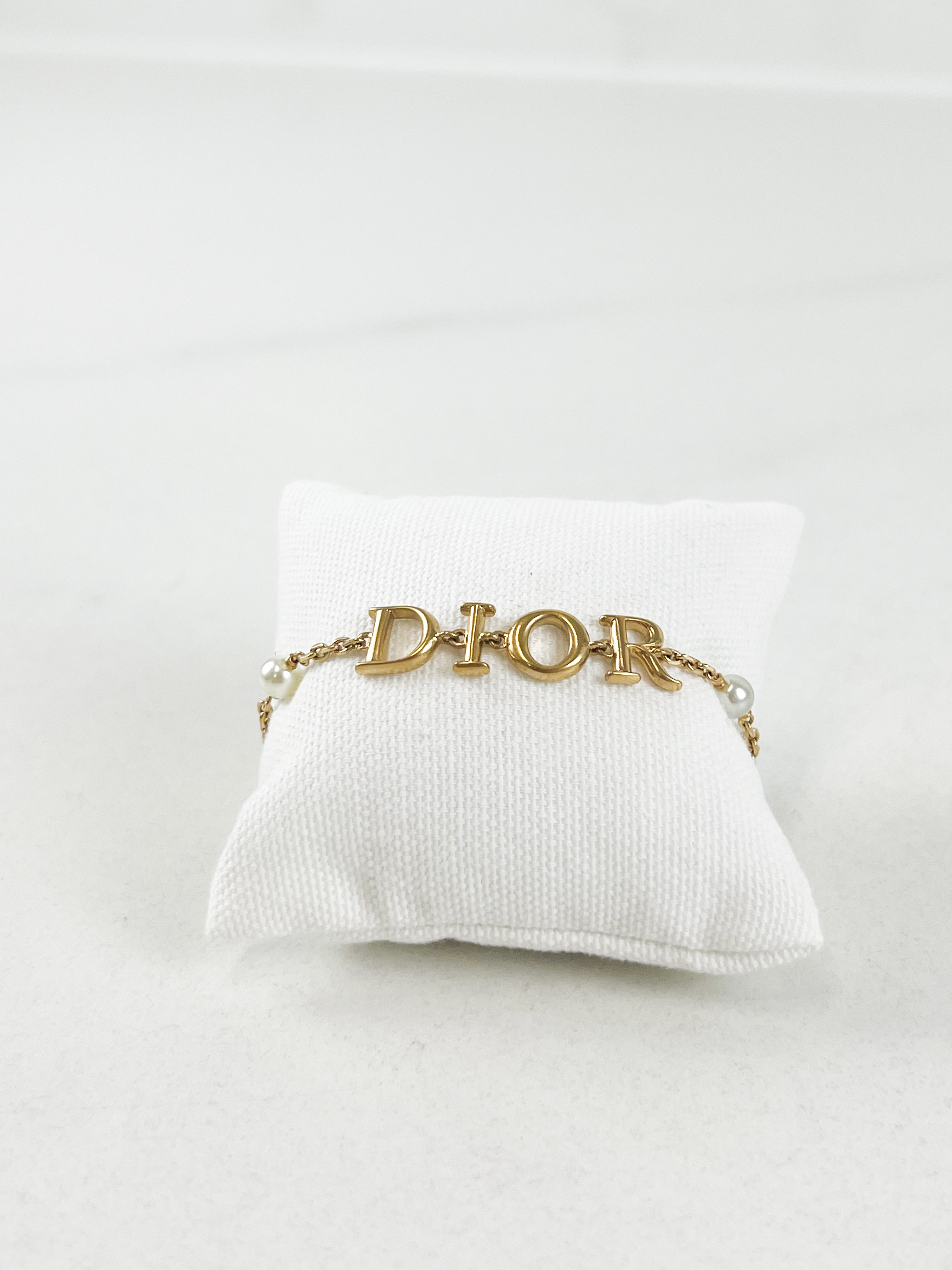 Christian Dior Revolution Bracelet in Gold with White Resin Pearls