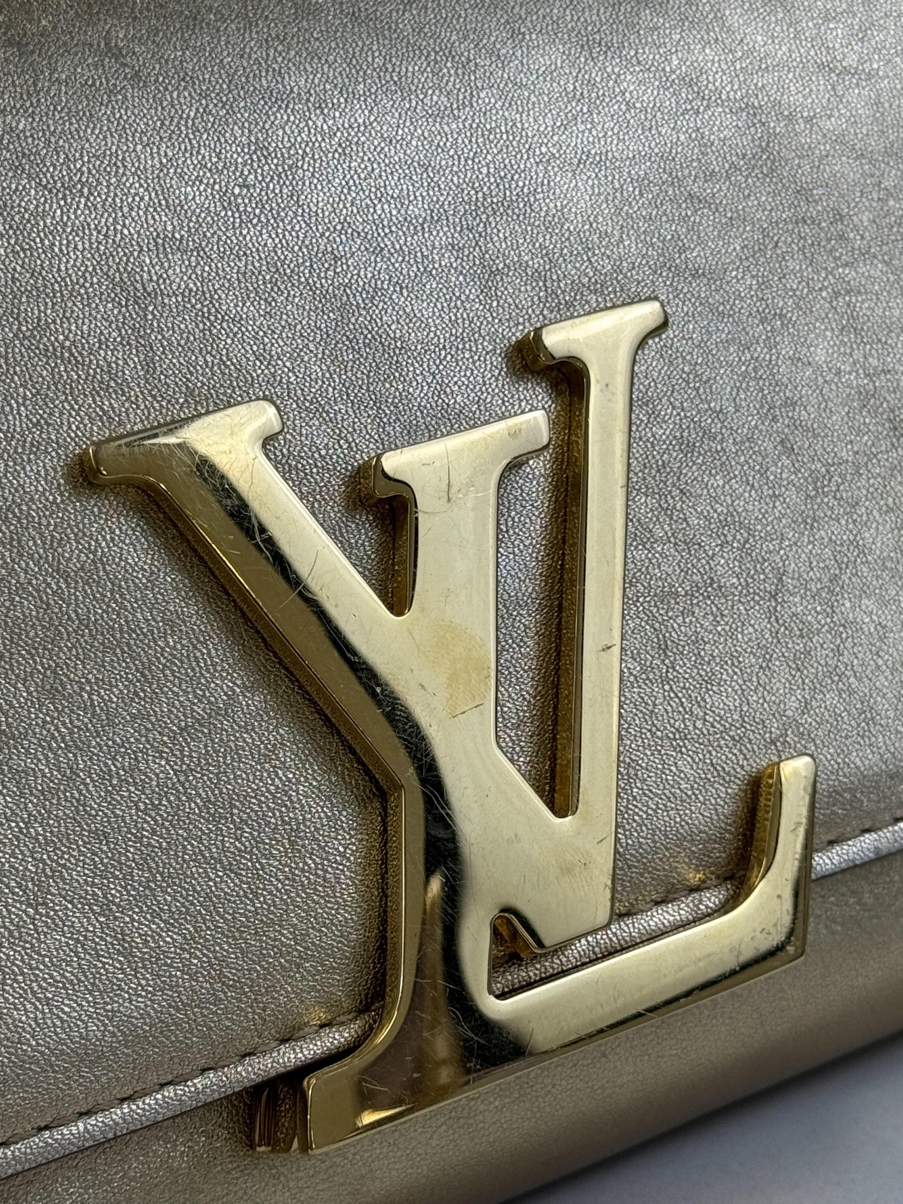 Louis Vuitton Gold St Louise Clutch
