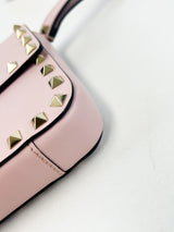 Valentino Garavani Blush Pink Rockstud Leather Clutch