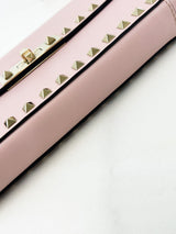 Valentino Garavani Blush Pink Rockstud Leather Clutch
