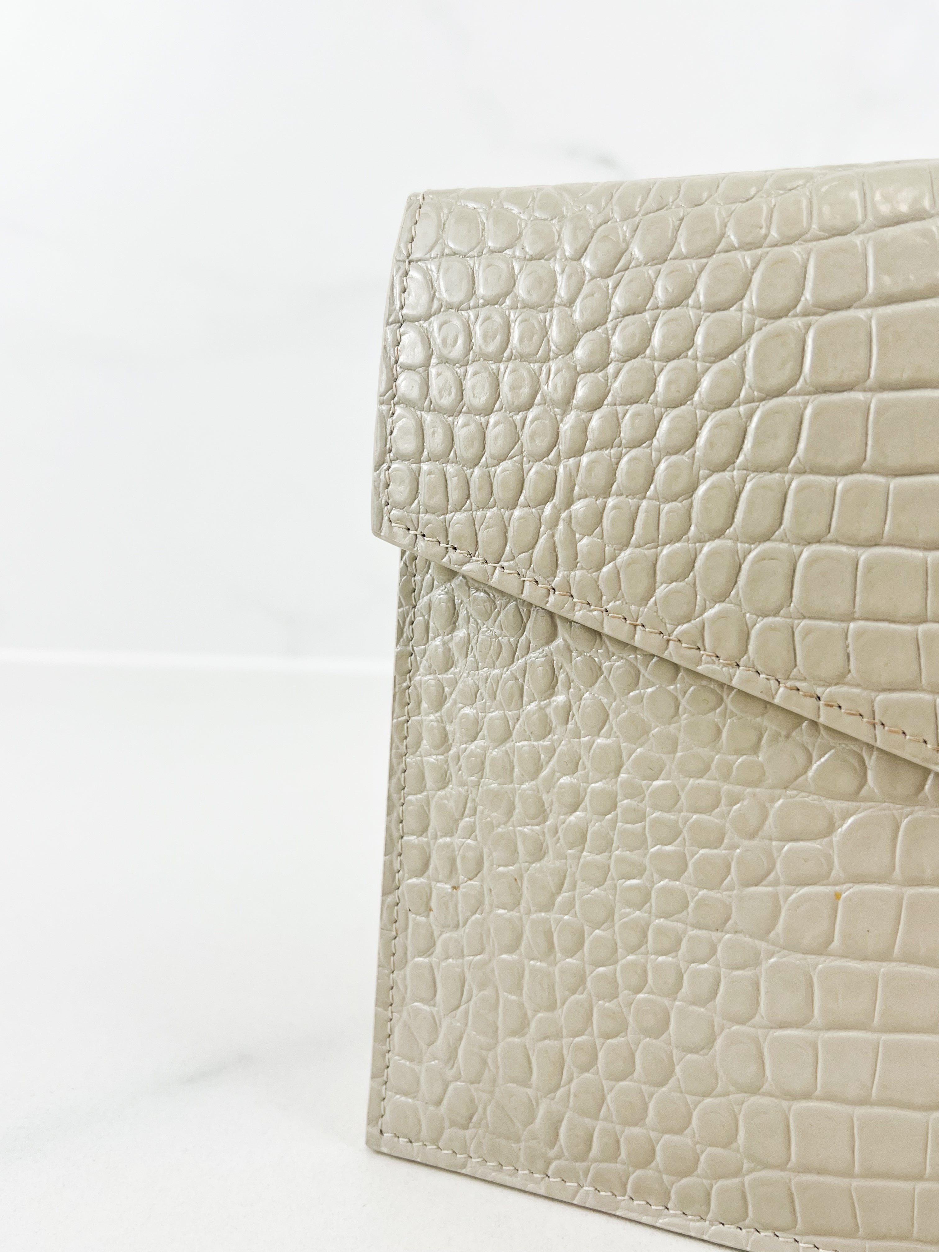 Saint Laurent Beige Uptown Pouch in Crema Soft Croc-Effect Leather
