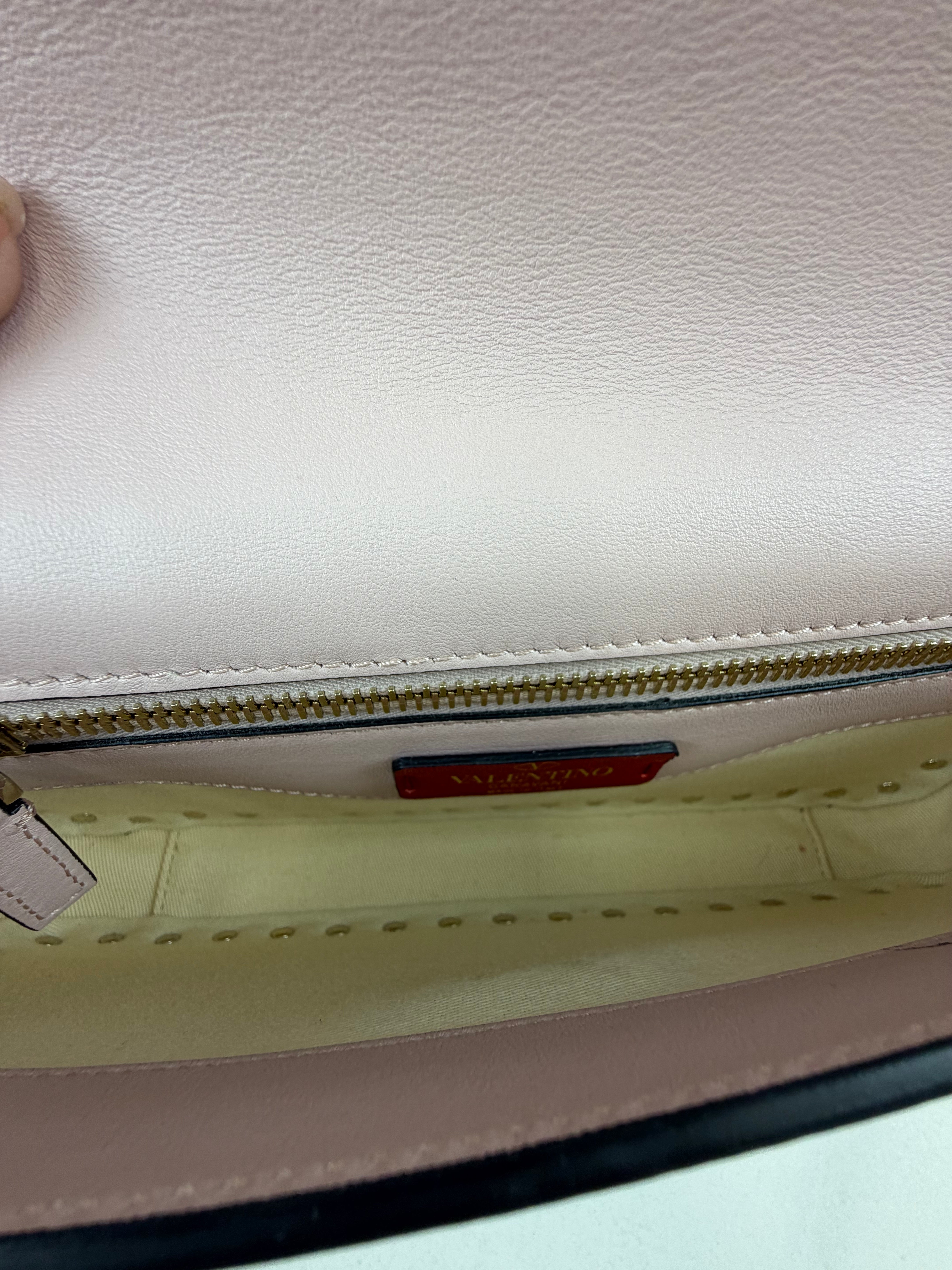 Valentino Garavani Blush Pink Rockstud Leather Clutch