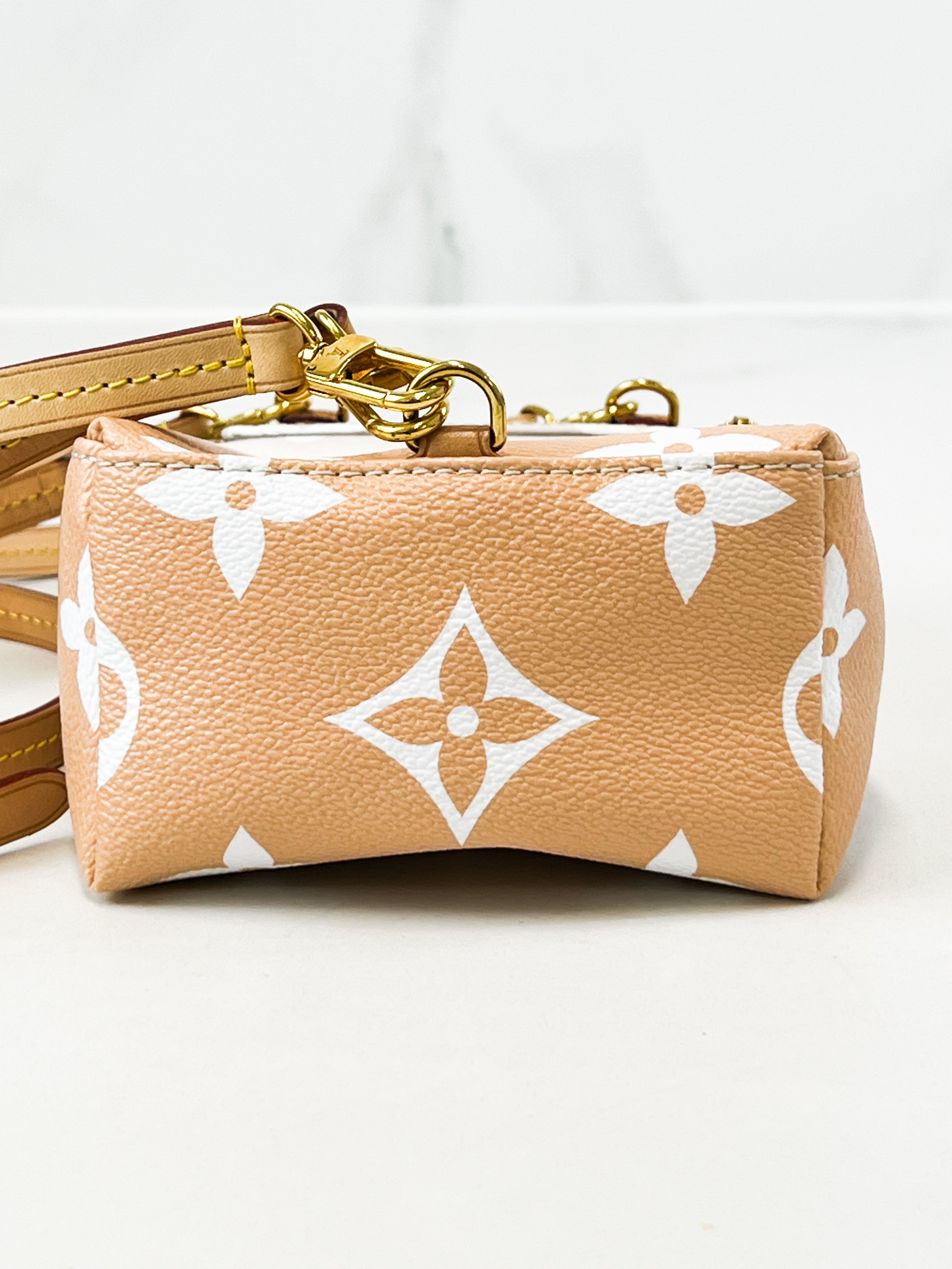 Louis Vuitton Empreinte Bicolour Monogram Tiny Back Pack