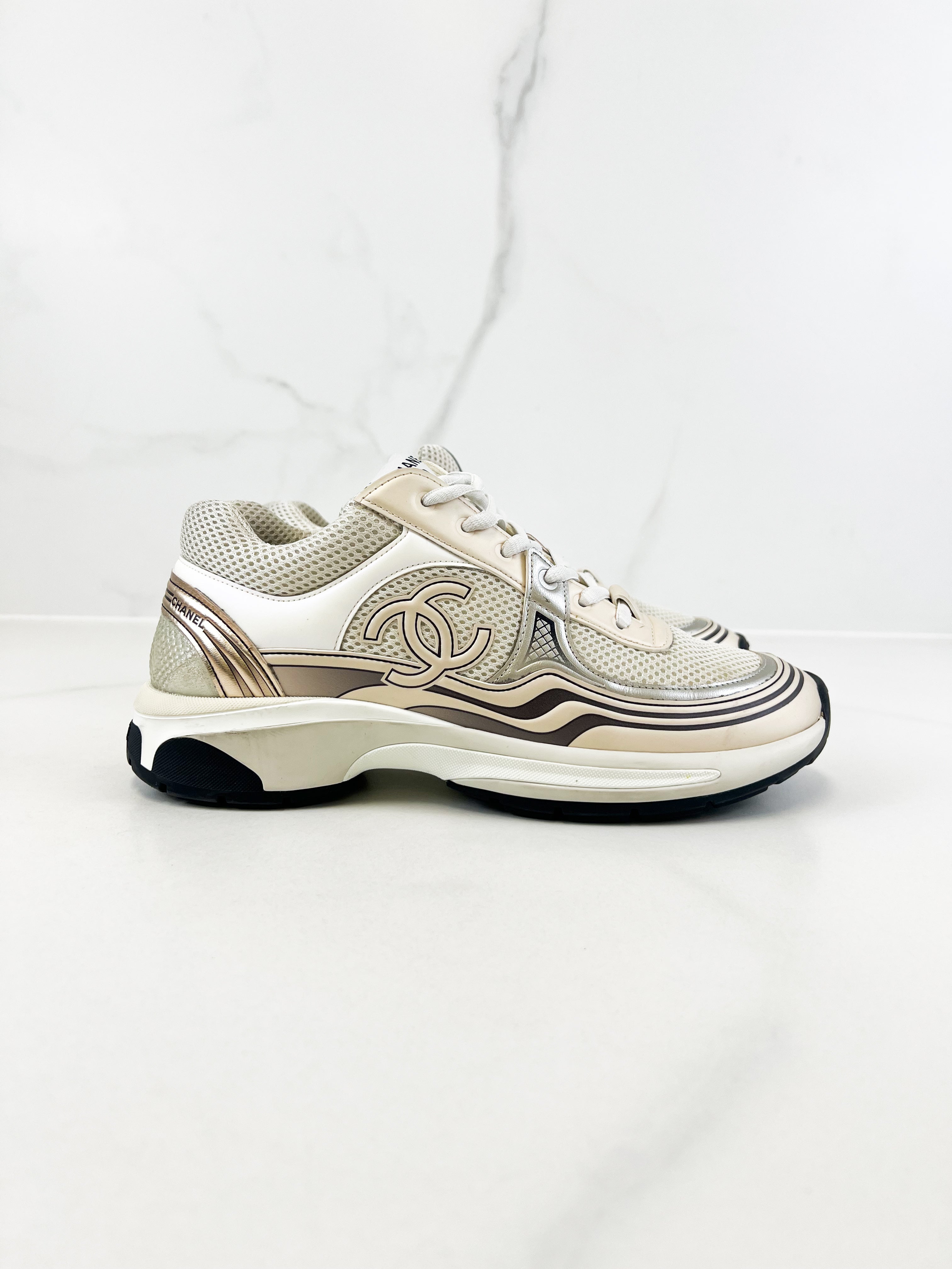 Chanel Laminated Leather and Fabric CC Low Top Sneakers In Ivory, White & Silver Size 39.5