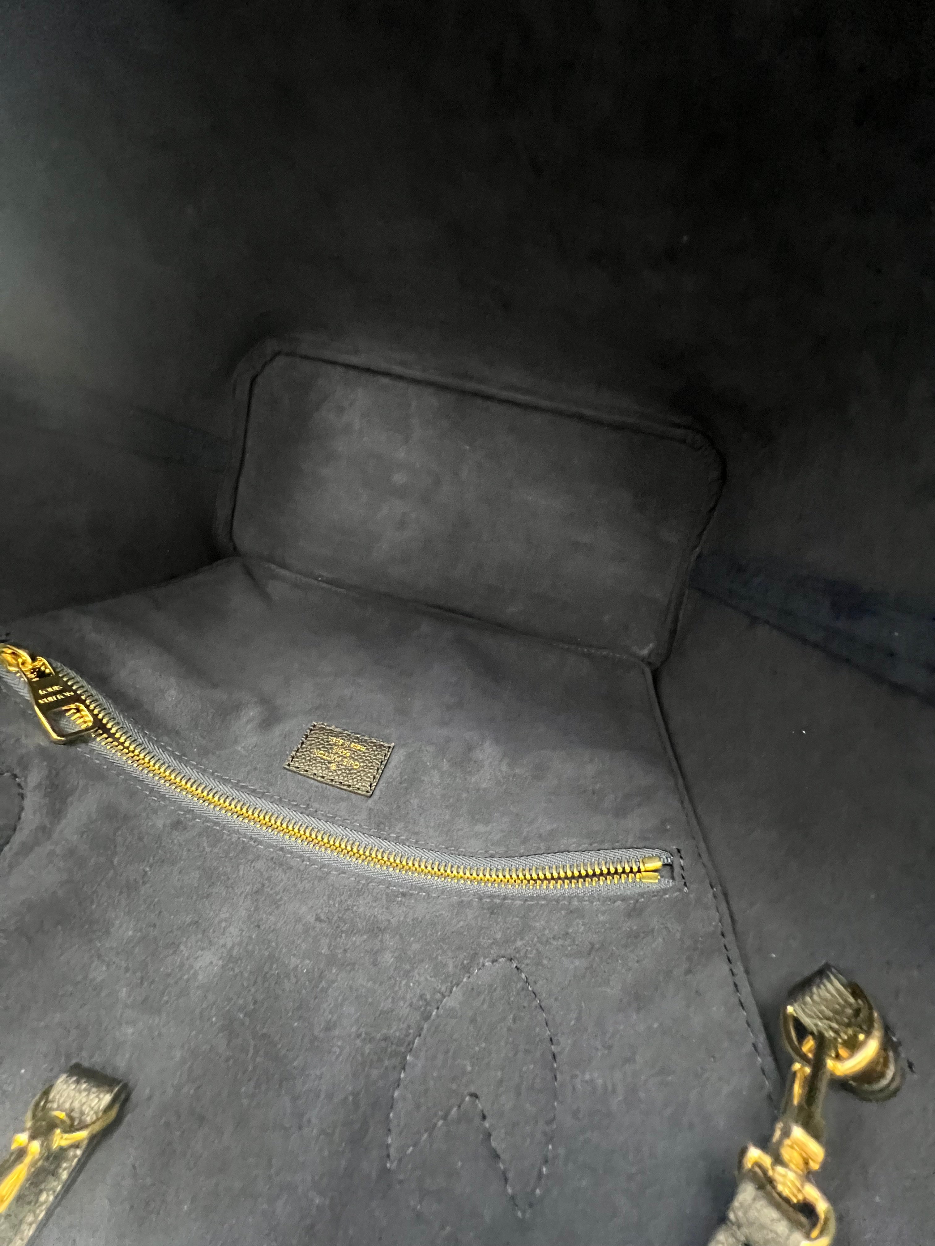 Louis Vuitton Neverfull MM in Black Monogram Empreinte Leather