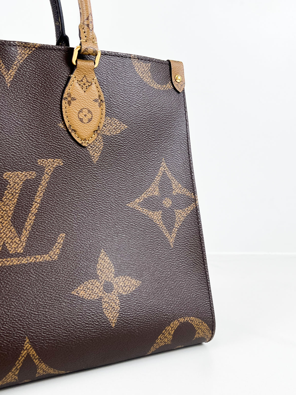 Louis Vuitton Onthego PM Reverse Monogram Canvas