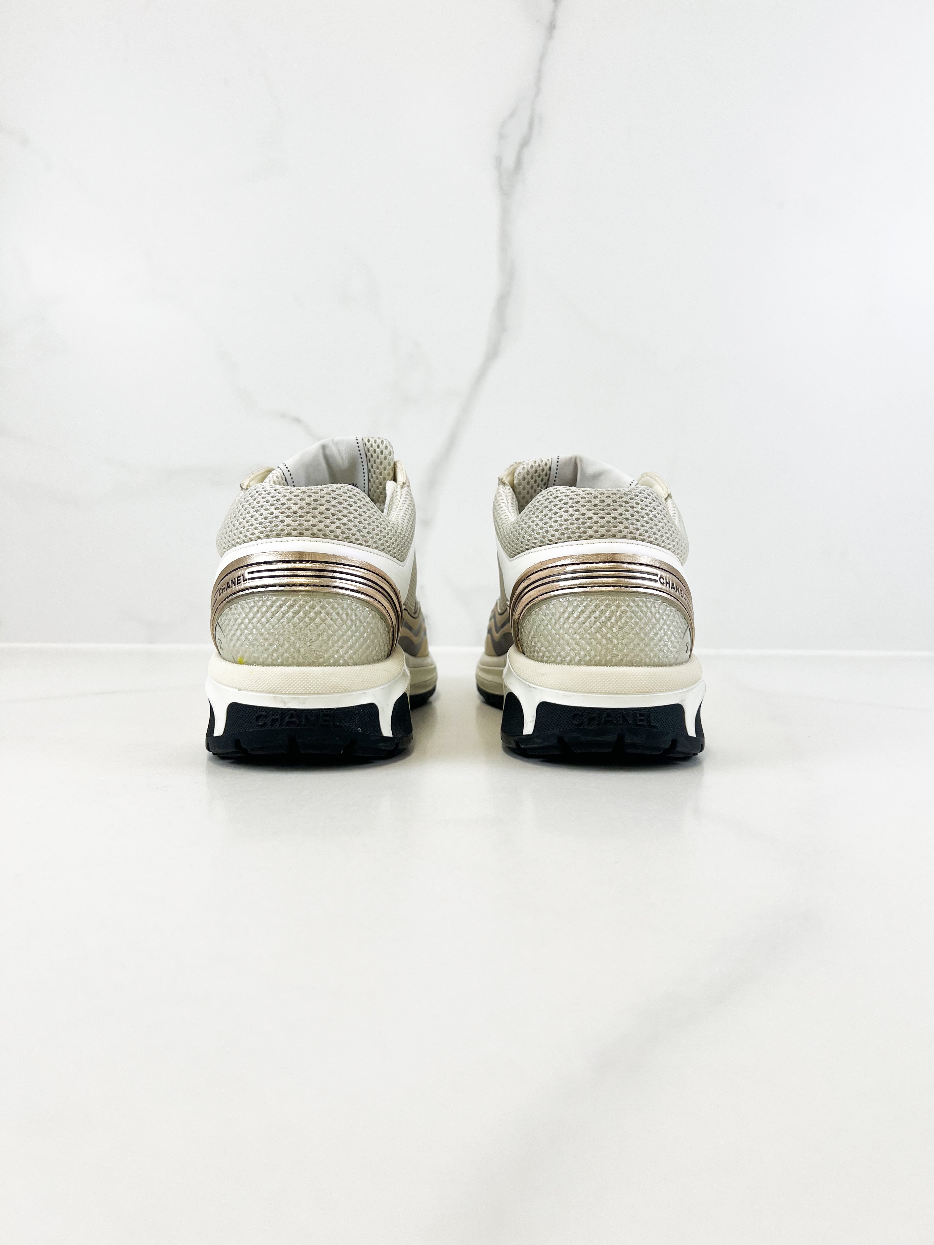 Chanel Laminated Leather and Fabric CC Low Top Sneakers In Ivory, White & Silver Size 39.5