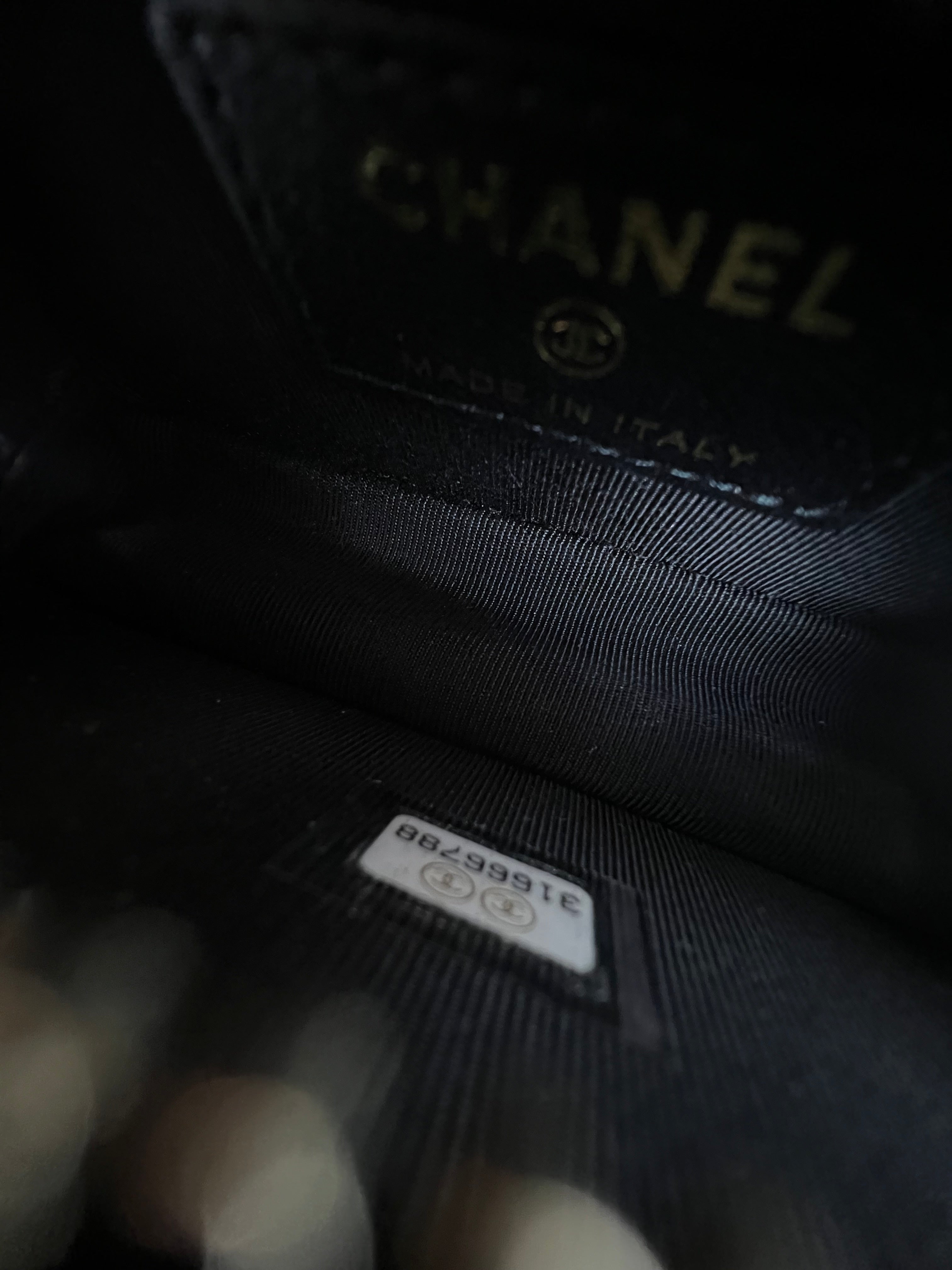 Chanel Lambskin Quilted Running Around Chain Mini Clutch