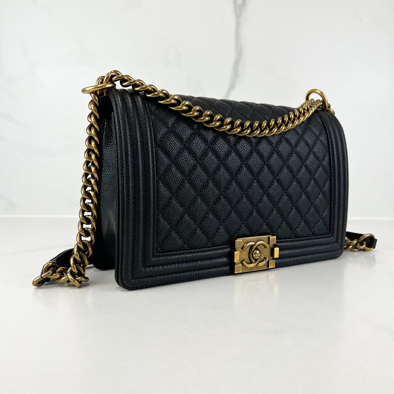 Chanel Black New Medium Caviar Boy Bag with Antique GHW – Shopluxe  Consignment